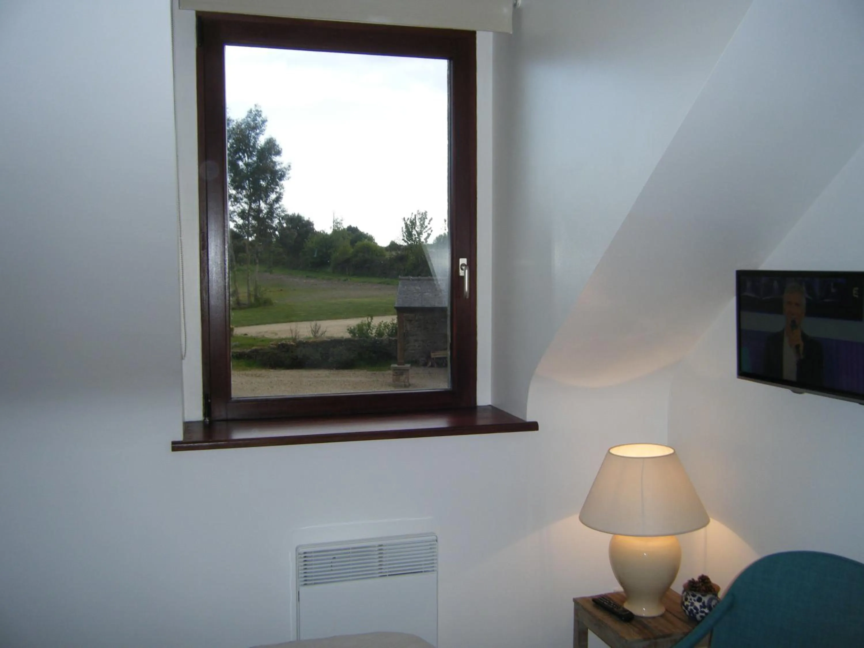 TV and multimedia in Les chambres du Manoir de Kerhel