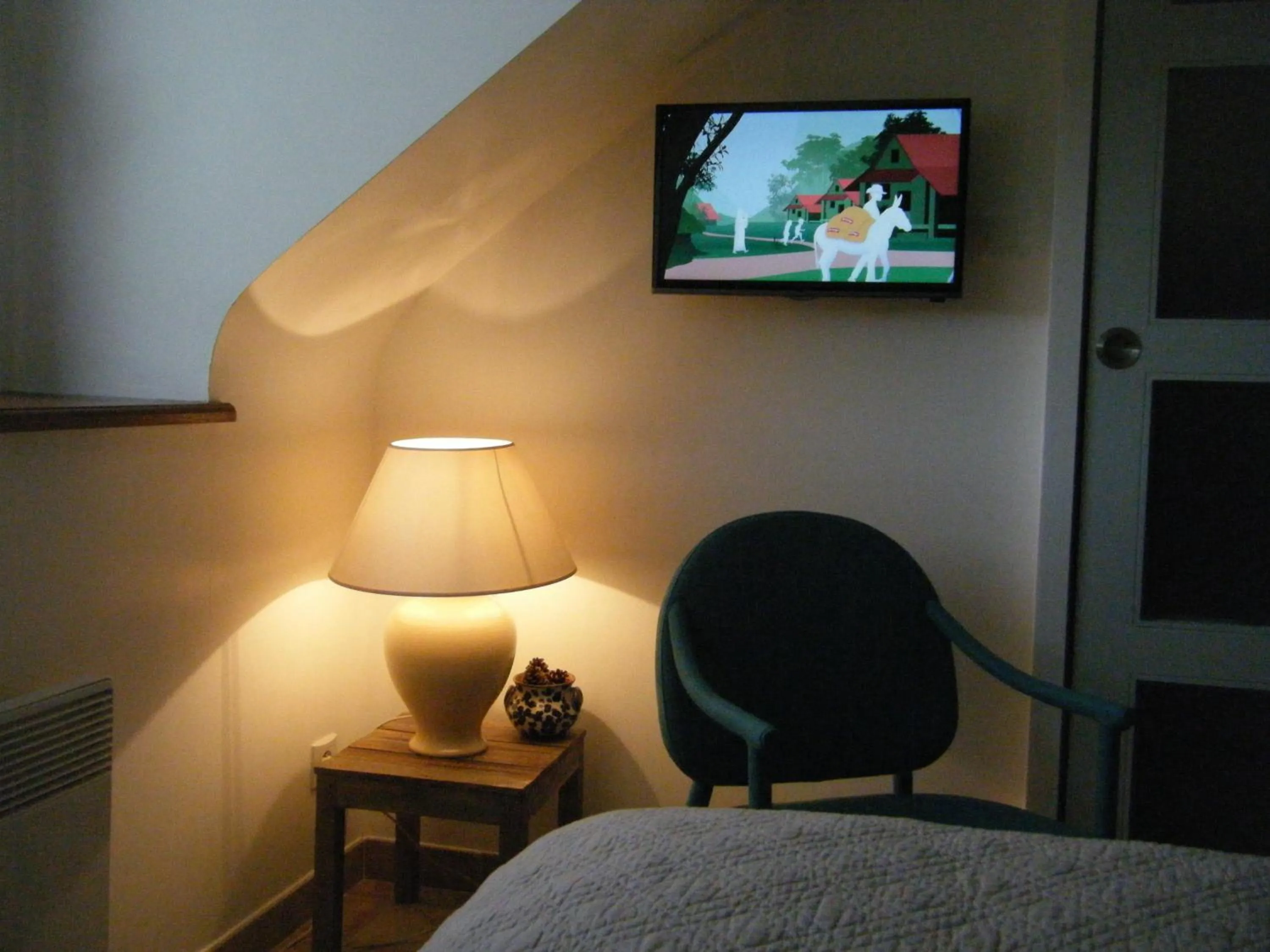Bed in Les chambres du Manoir de Kerhel