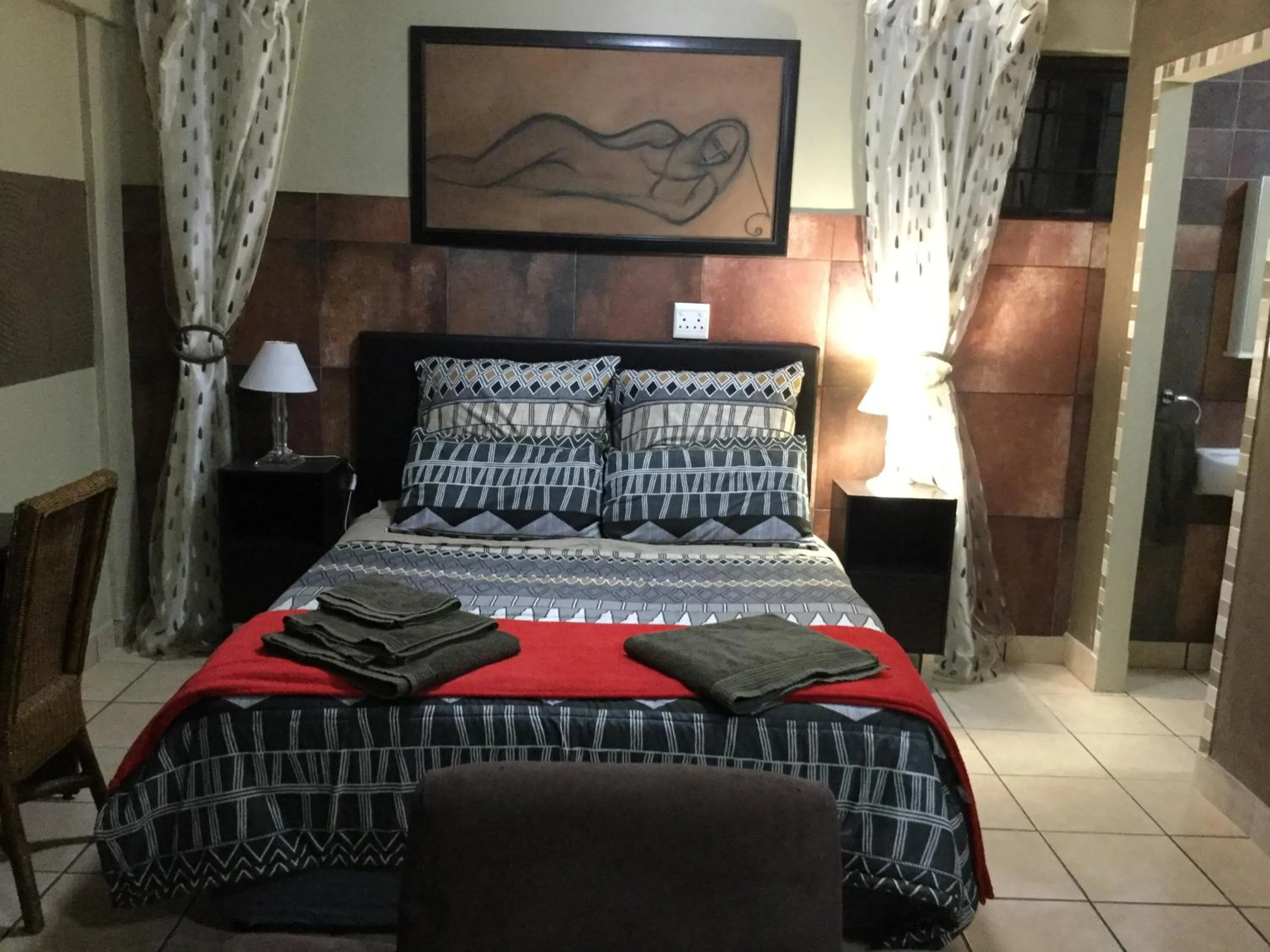 Photo of the whole room, Bed in The Buddha Garden