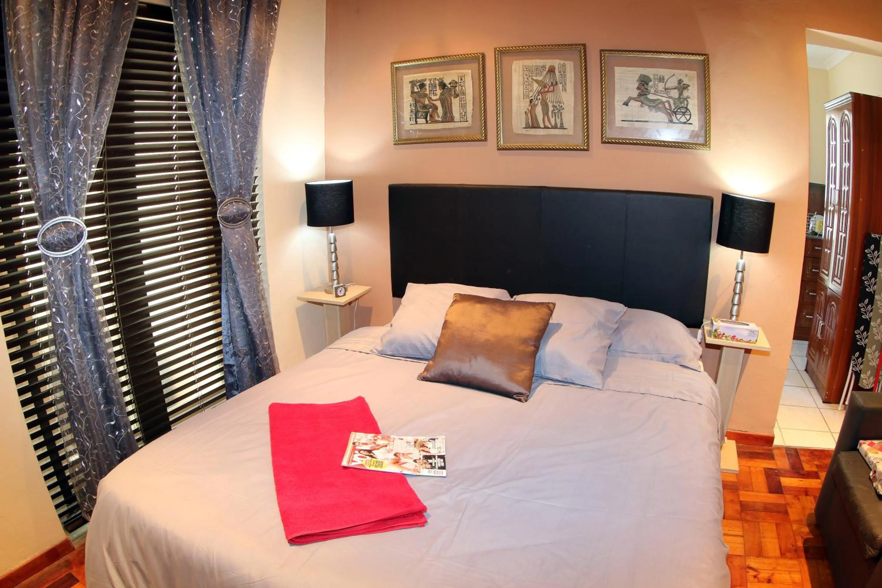 Photo of the whole room, Bed in The Buddha Garden