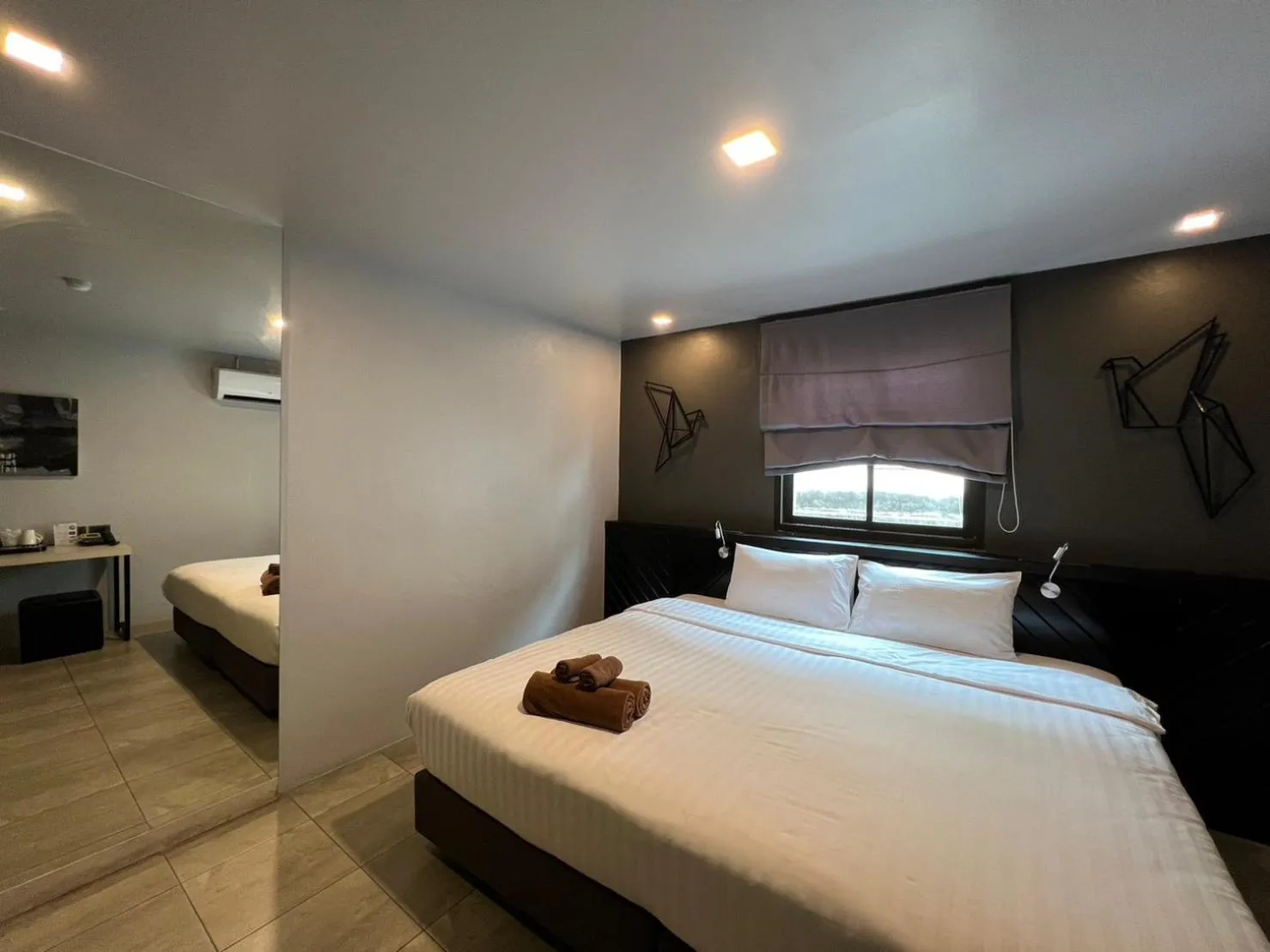 Bed in WE Terminal Hotel