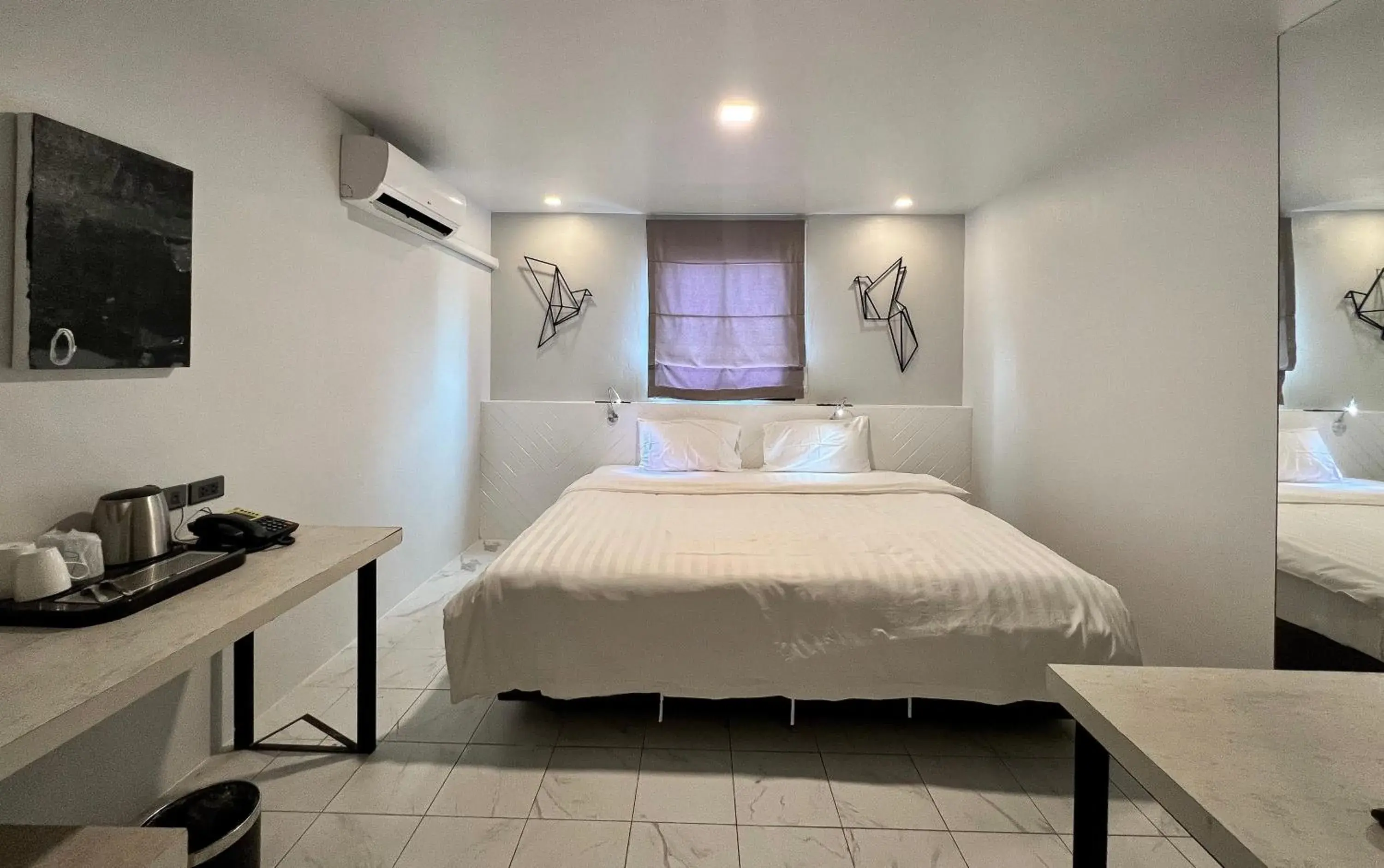 Bed in WE Terminal Hotel Bed in WE Terminal Hotel