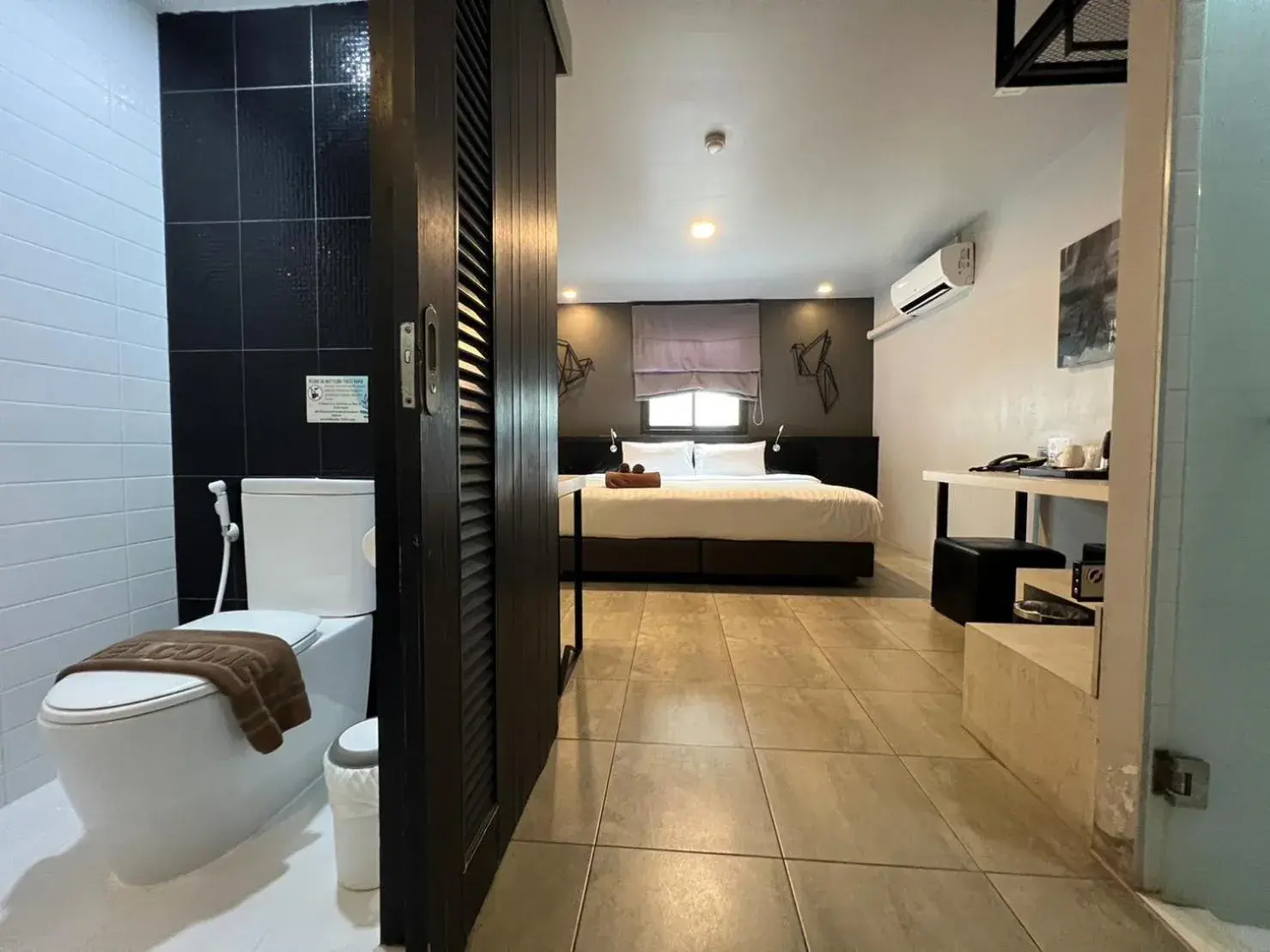 Toilet, Bed in WE Terminal Hotel Toilet, Bed in WE Terminal Hotel