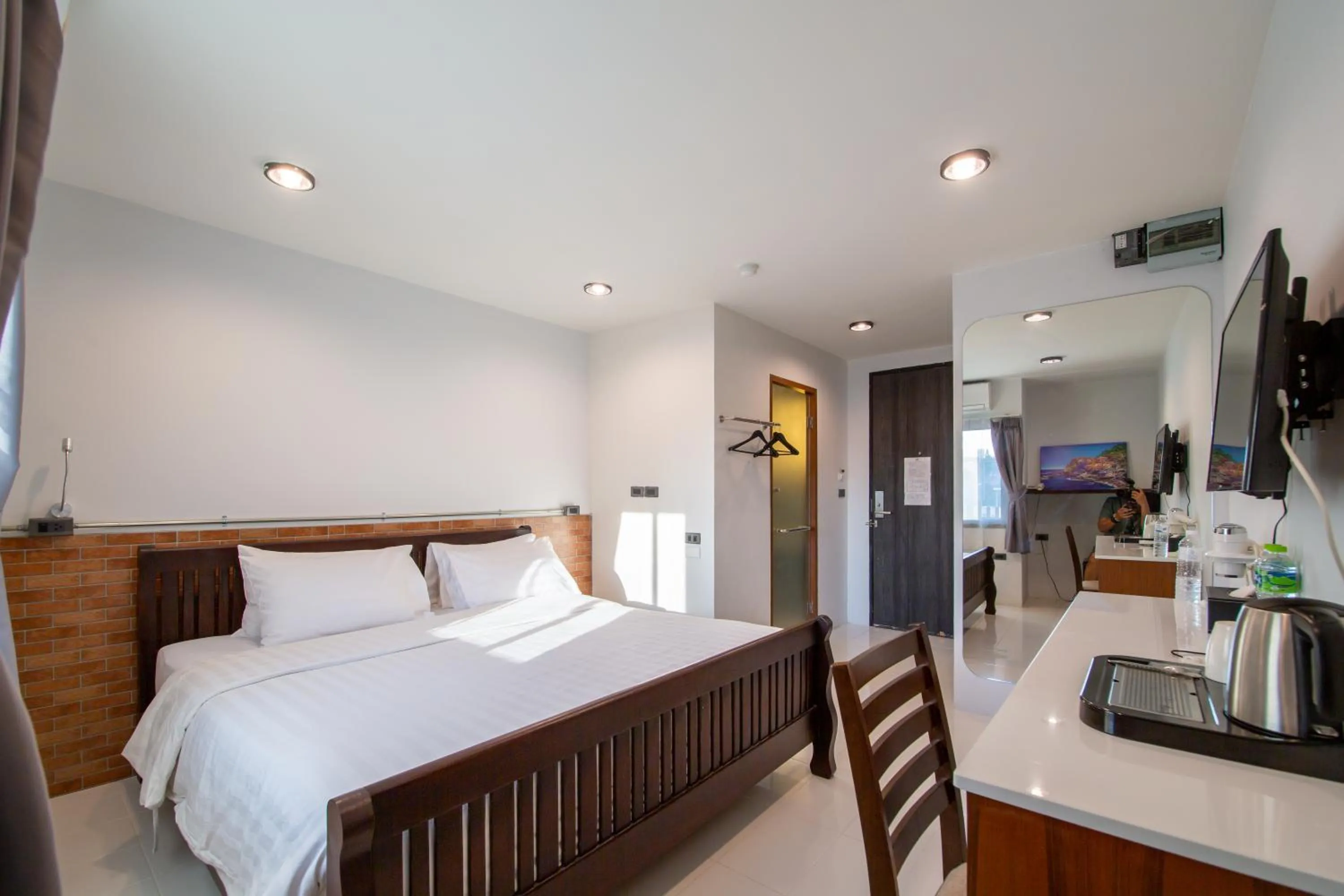 Photo of the whole room, Bed in WE Terminal Hotel