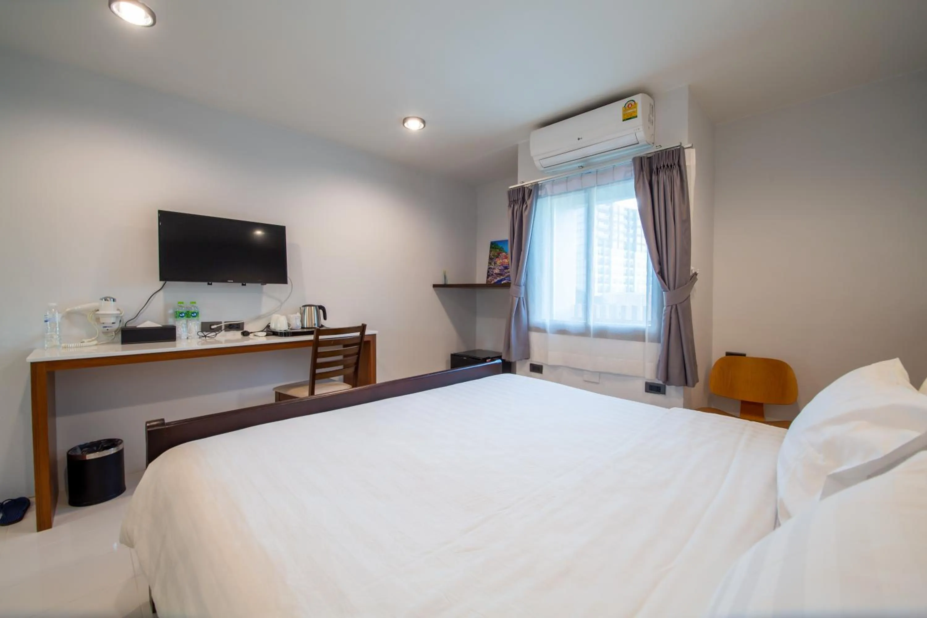 Bed in WE Terminal Hotel