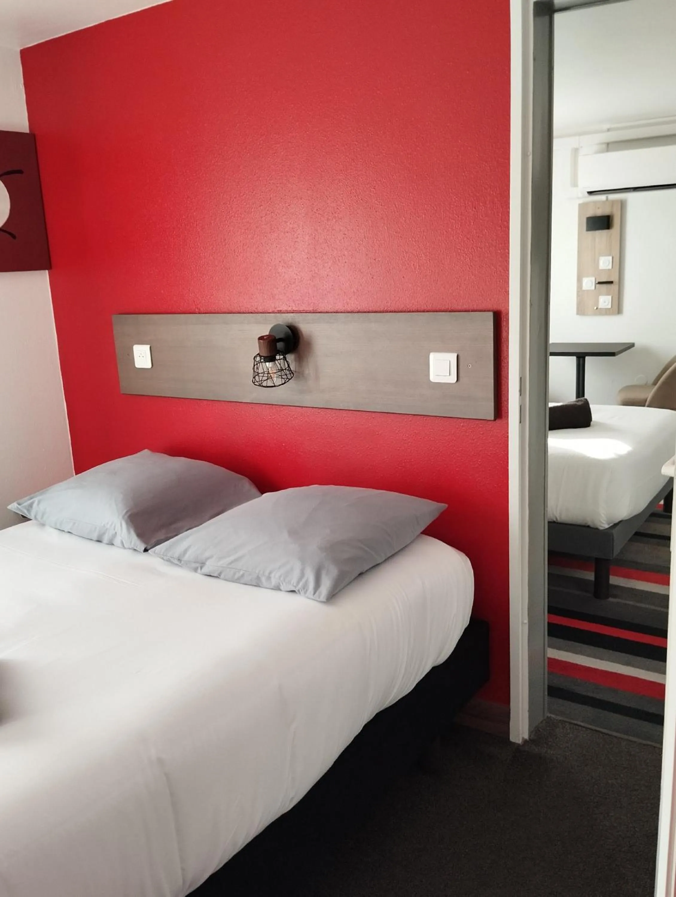 Bed in Kyriad Direct Saintes