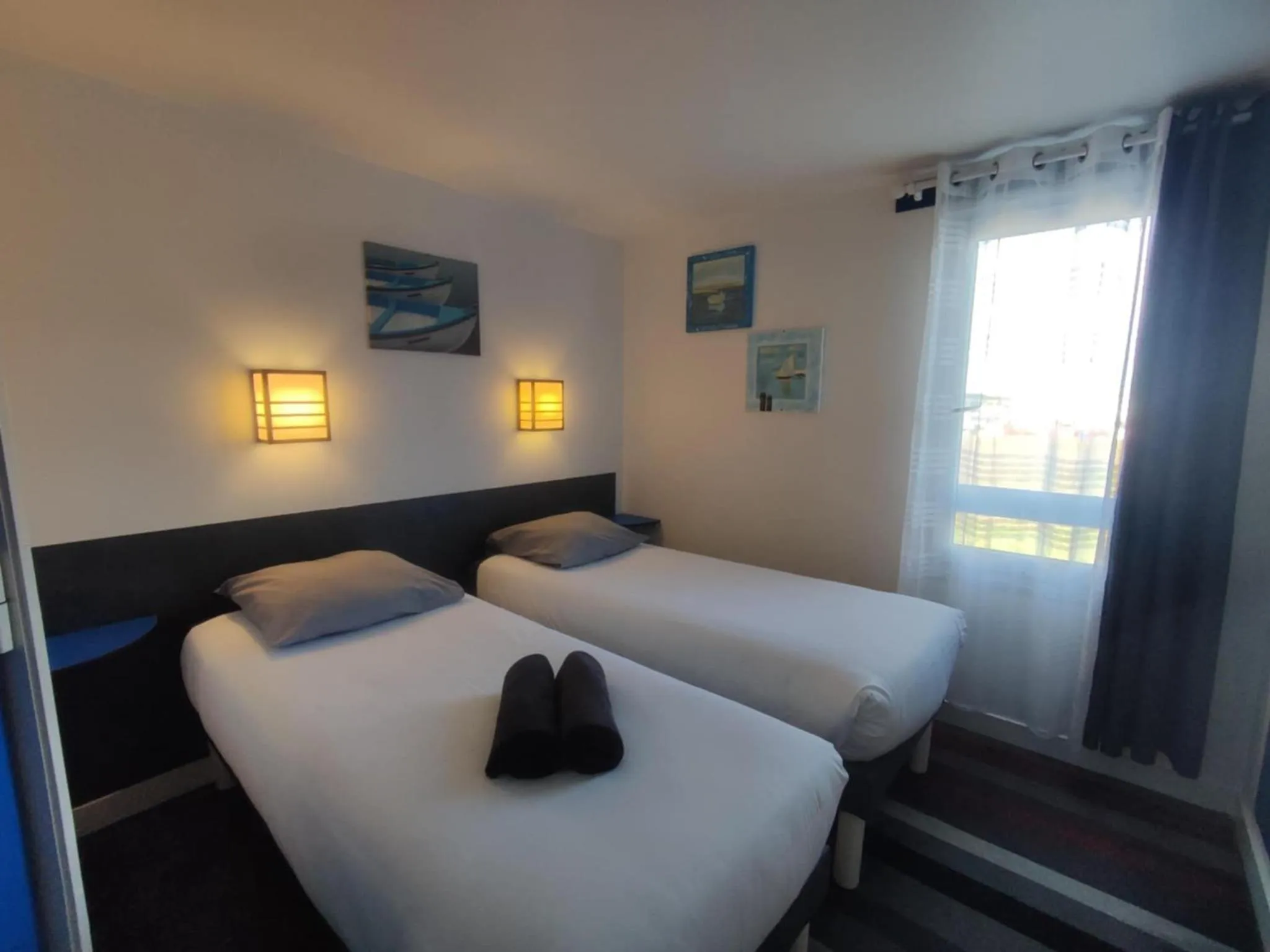 Bed in Kyriad Direct Saintes