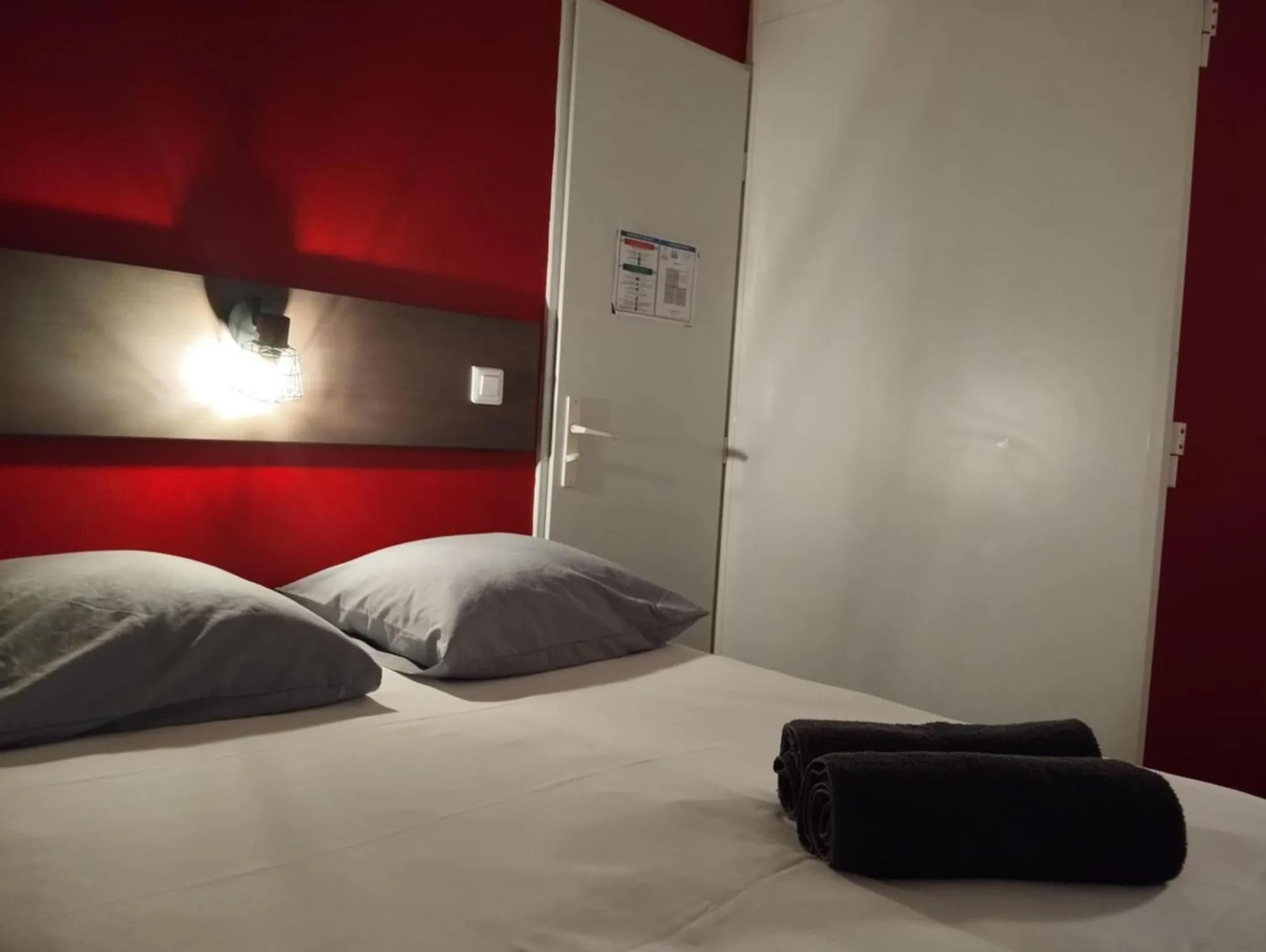 Photo of the whole room, Bed in Kyriad Direct Saintes