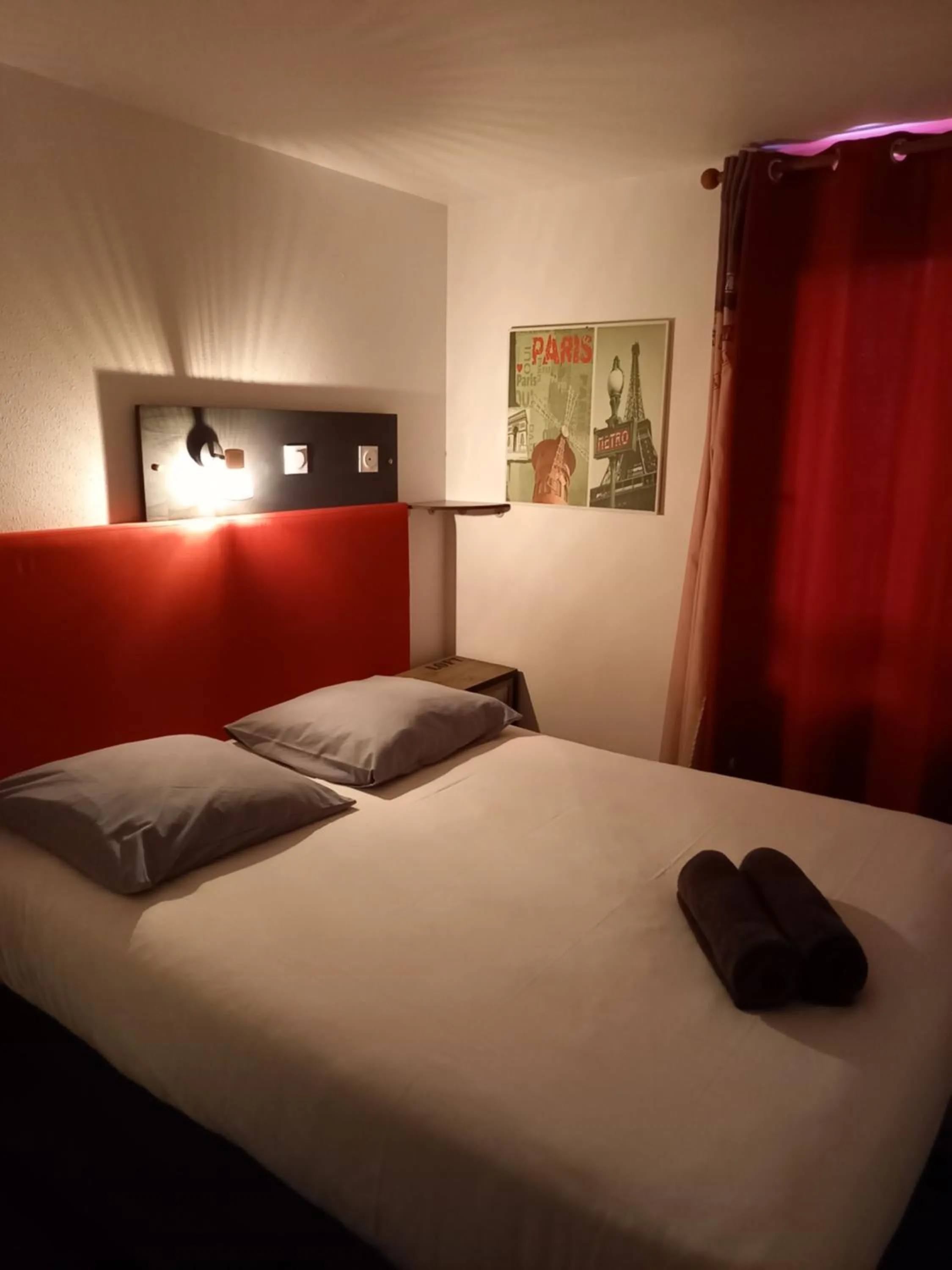 Bed in Kyriad Direct Saintes