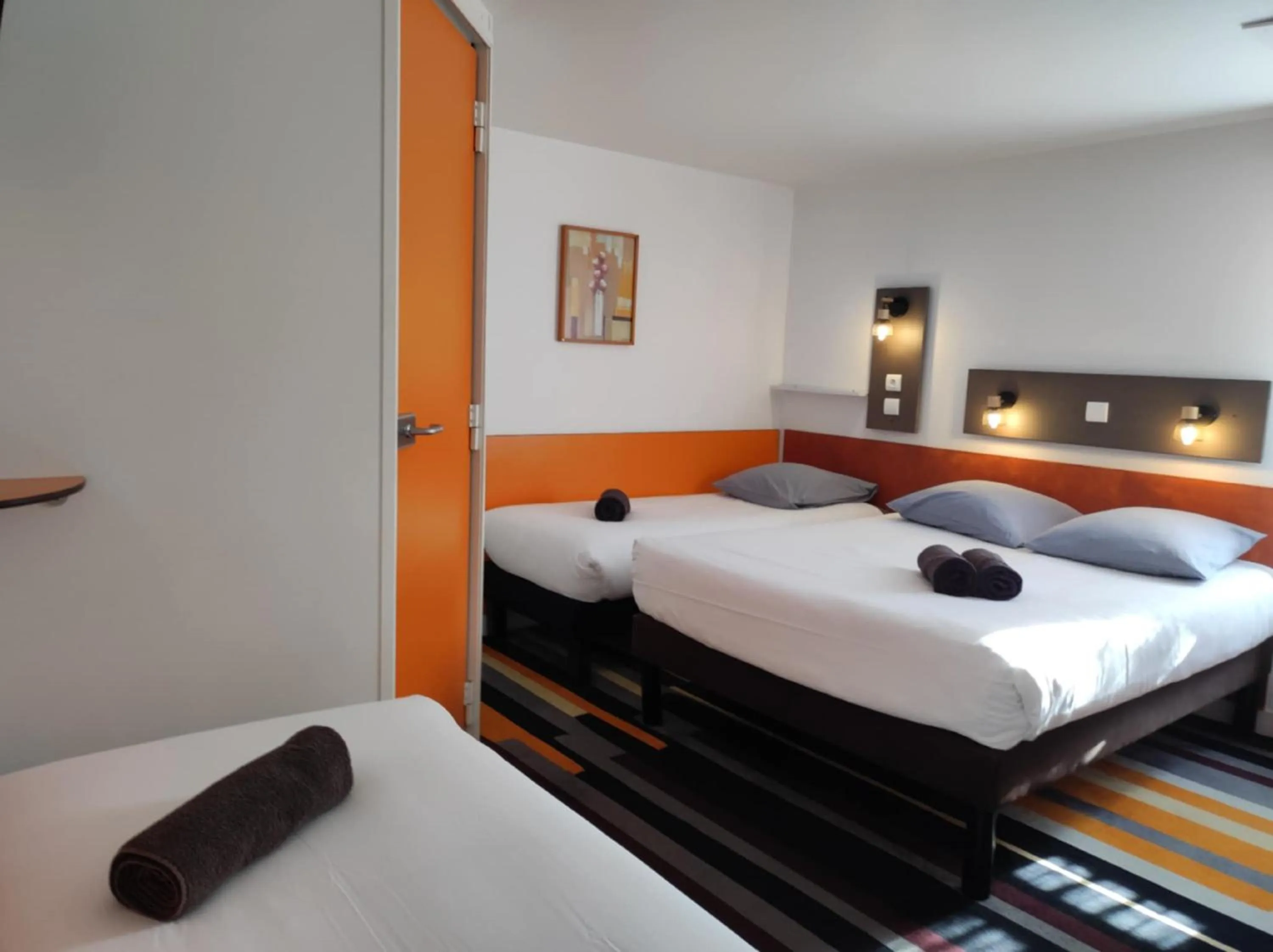 Bed in Kyriad Direct Saintes