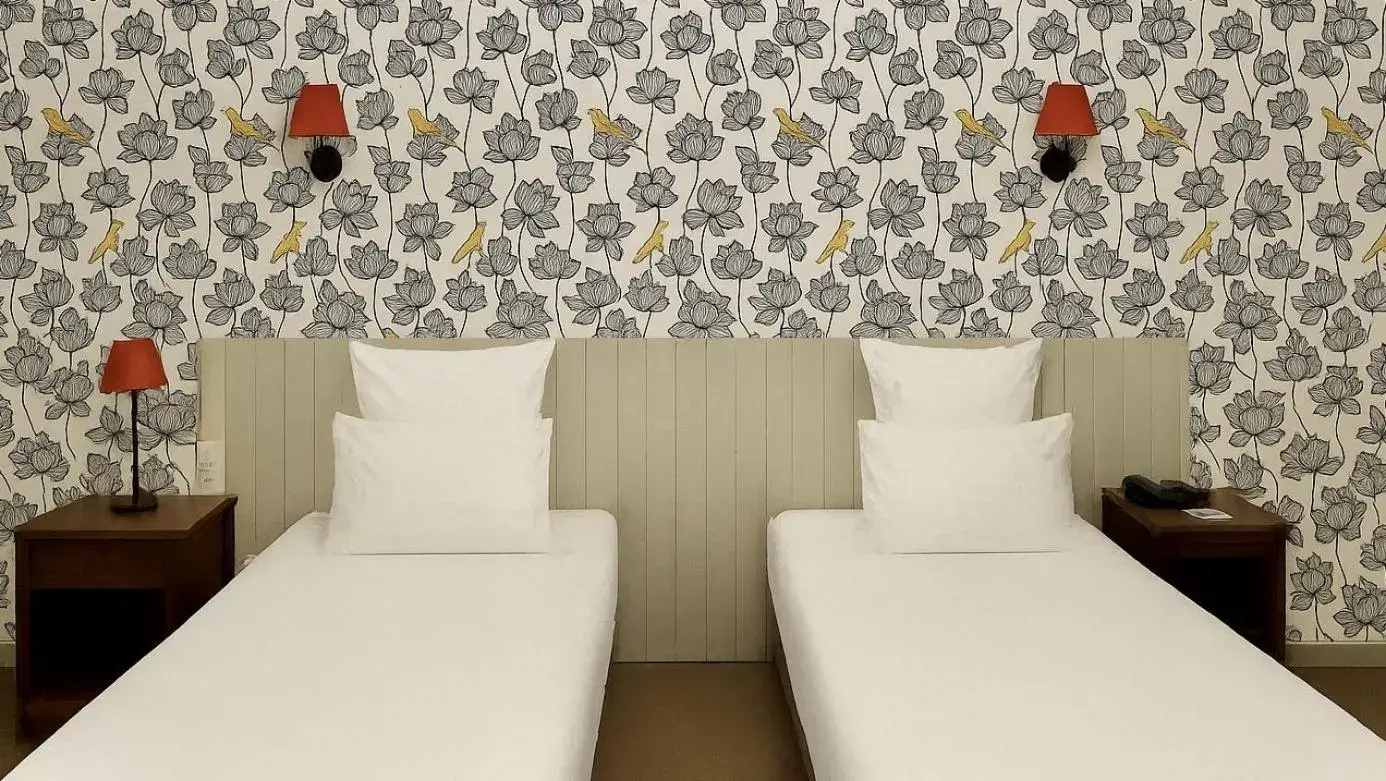 Bed in Cit'Hotel des Messageries Bed in Cit'Hotel des Messageries