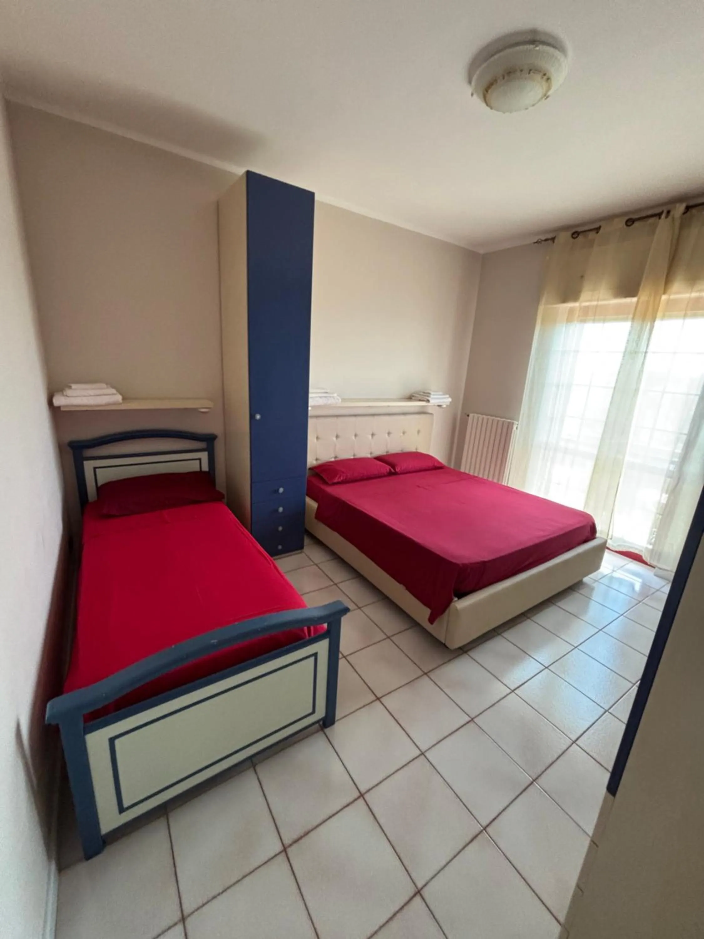 Bed in B&B Villa dei Fiori