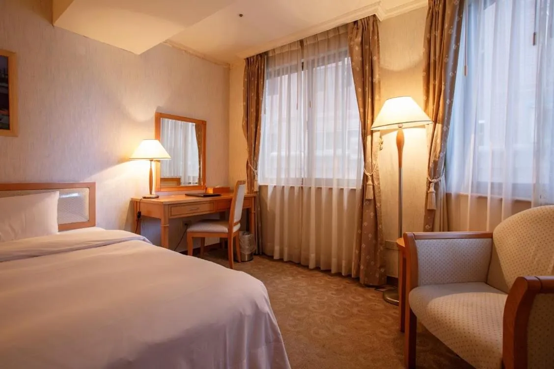 Bed in The Koos Hotel