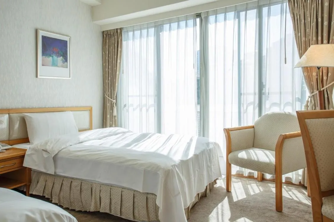 Bed in The Koos Hotel