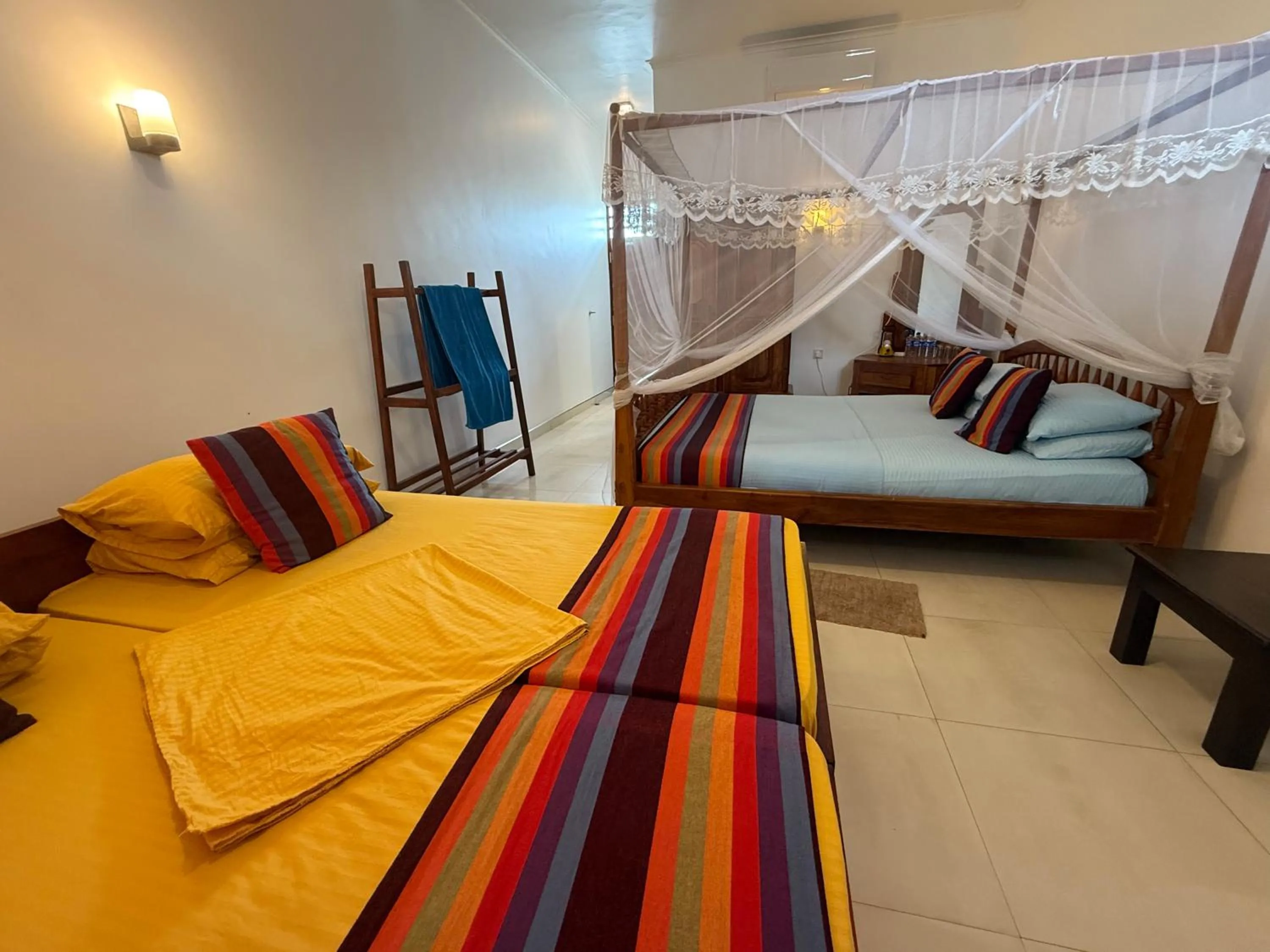 Bed in Samaru Beach House
