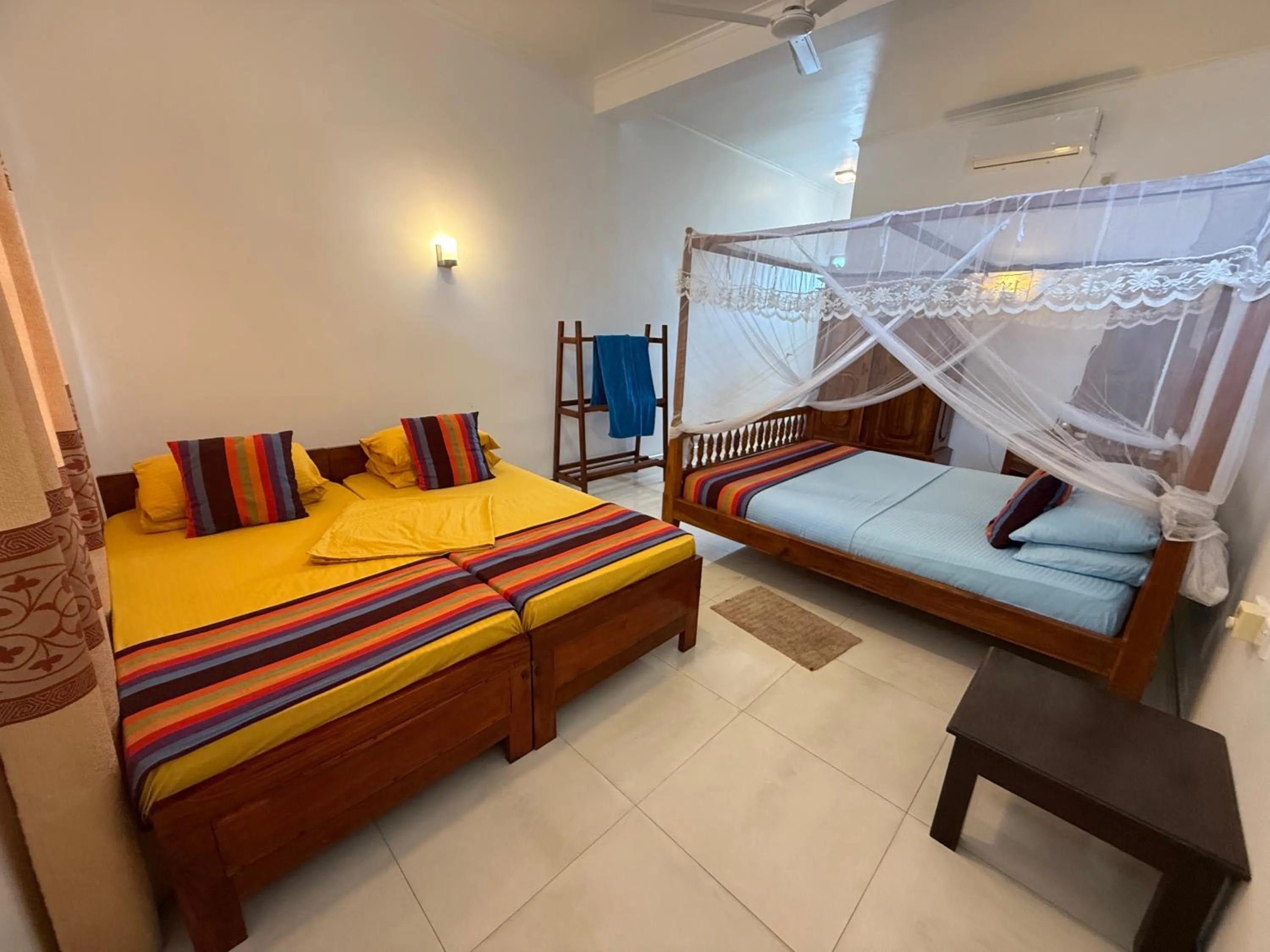 Bed in Samaru Beach House