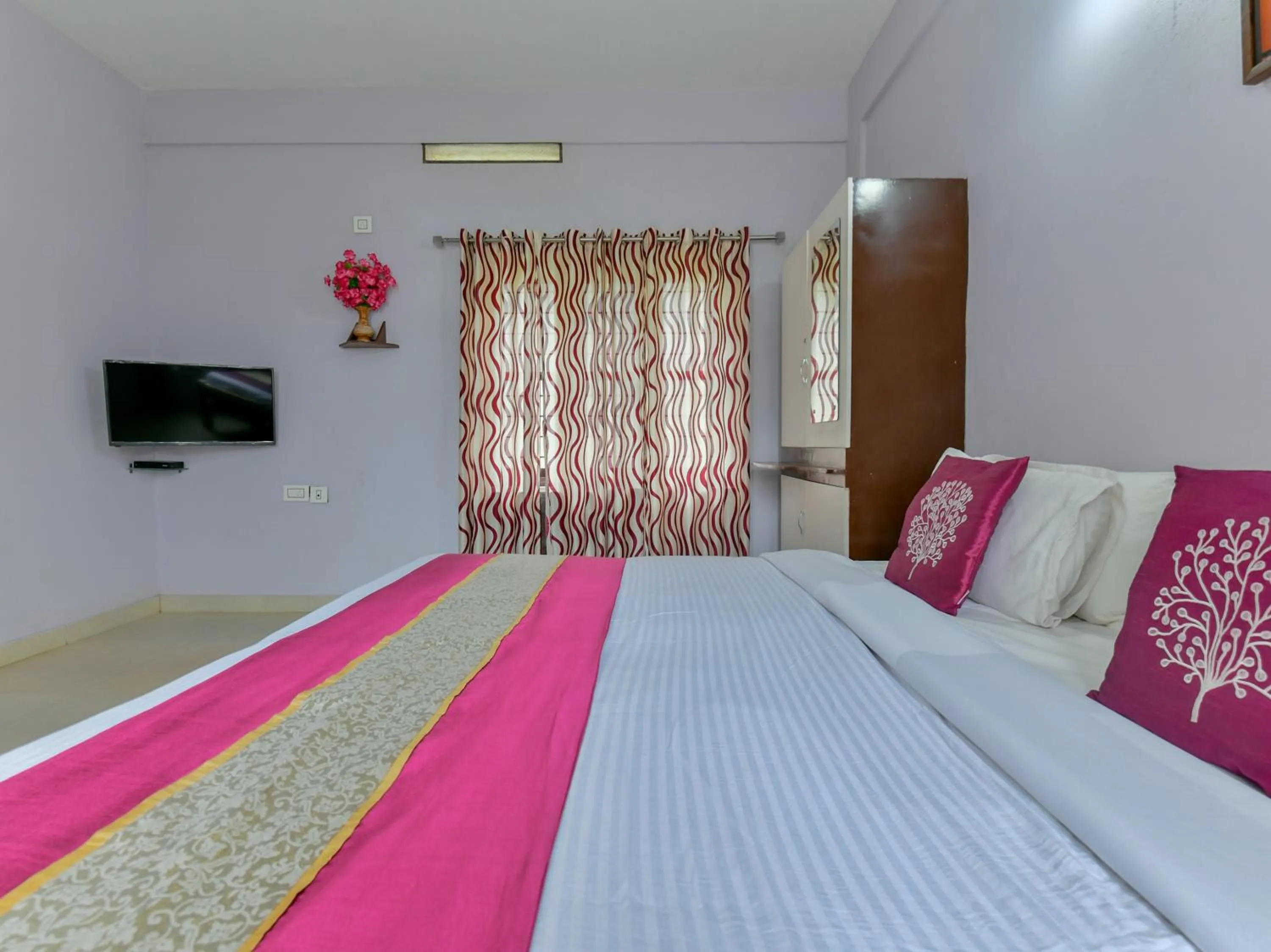 Bed in Gooseberry Family Retreats - Wayanad by KARAPUZHA RESORTS