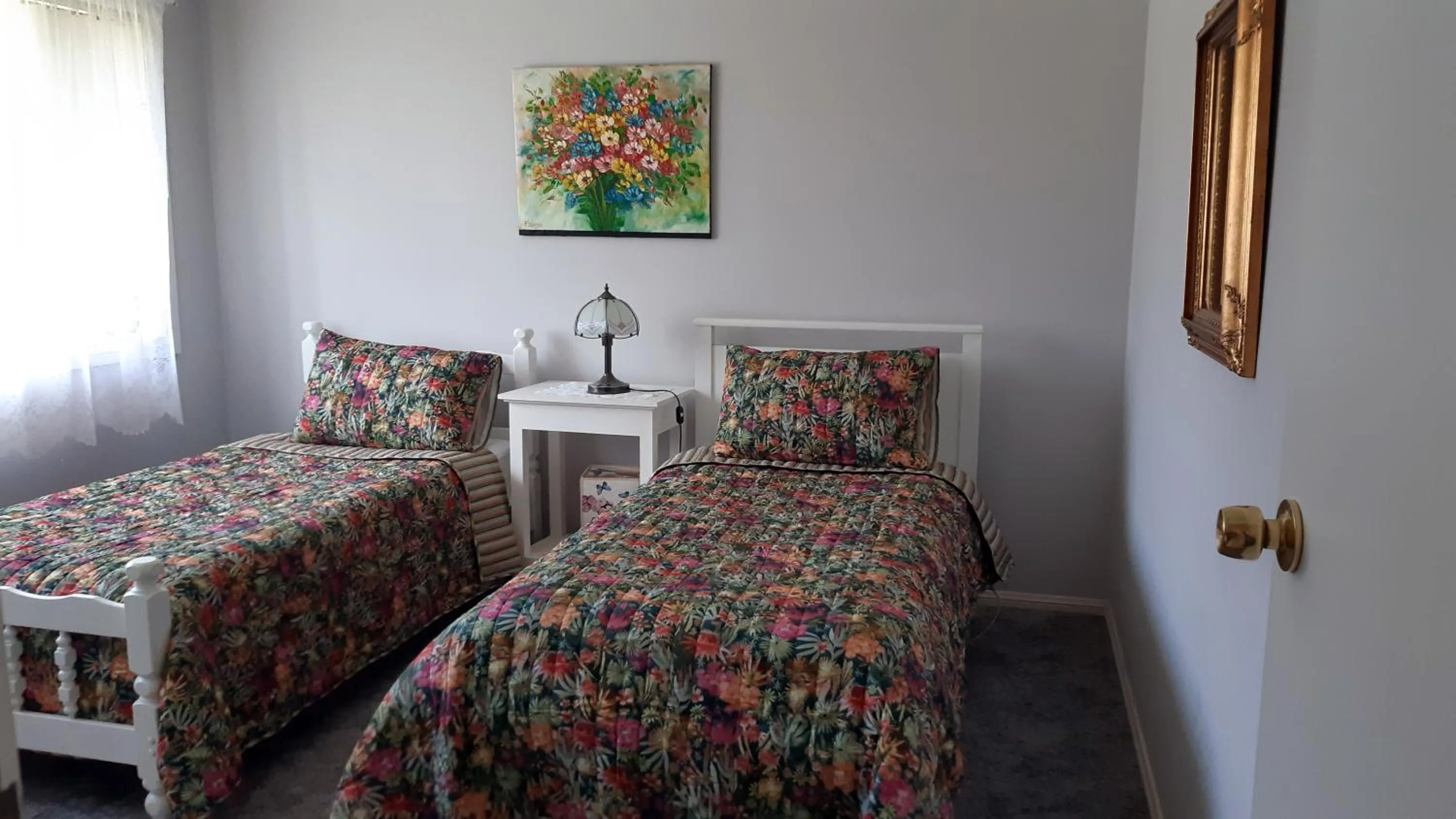 Bed in Butterfly Cottage