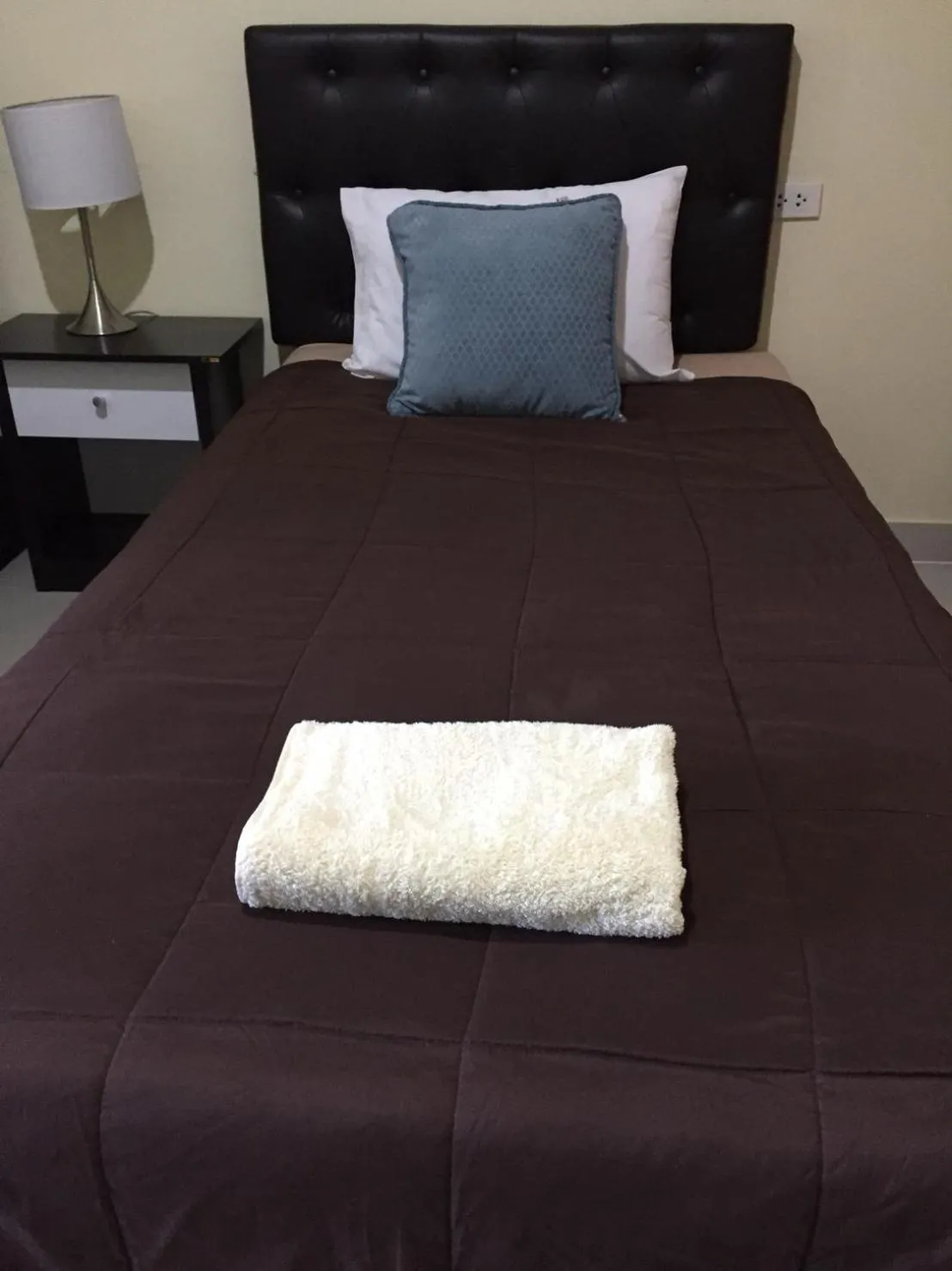 Bed in Connect Apartment
