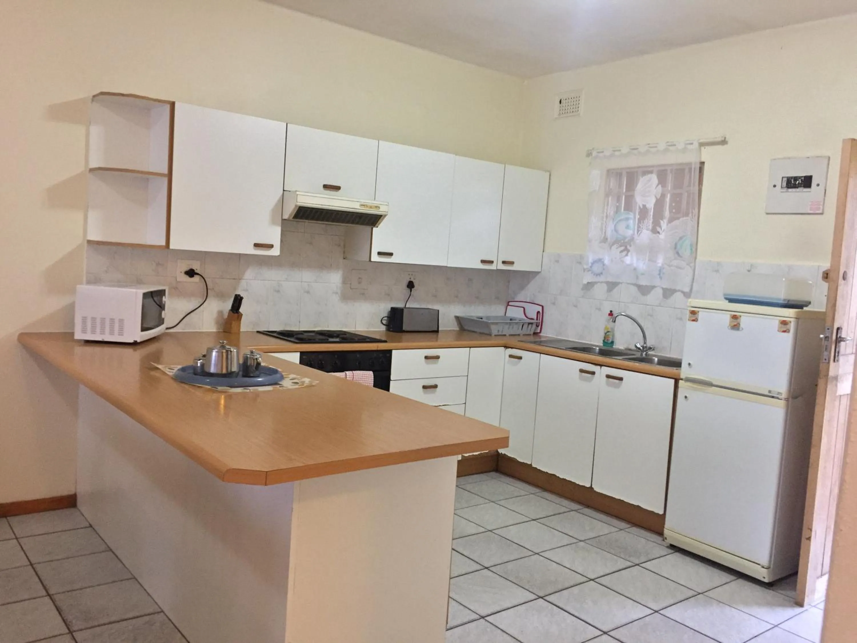 Kitchen or kitchenette in Doonside Holiday Apartments