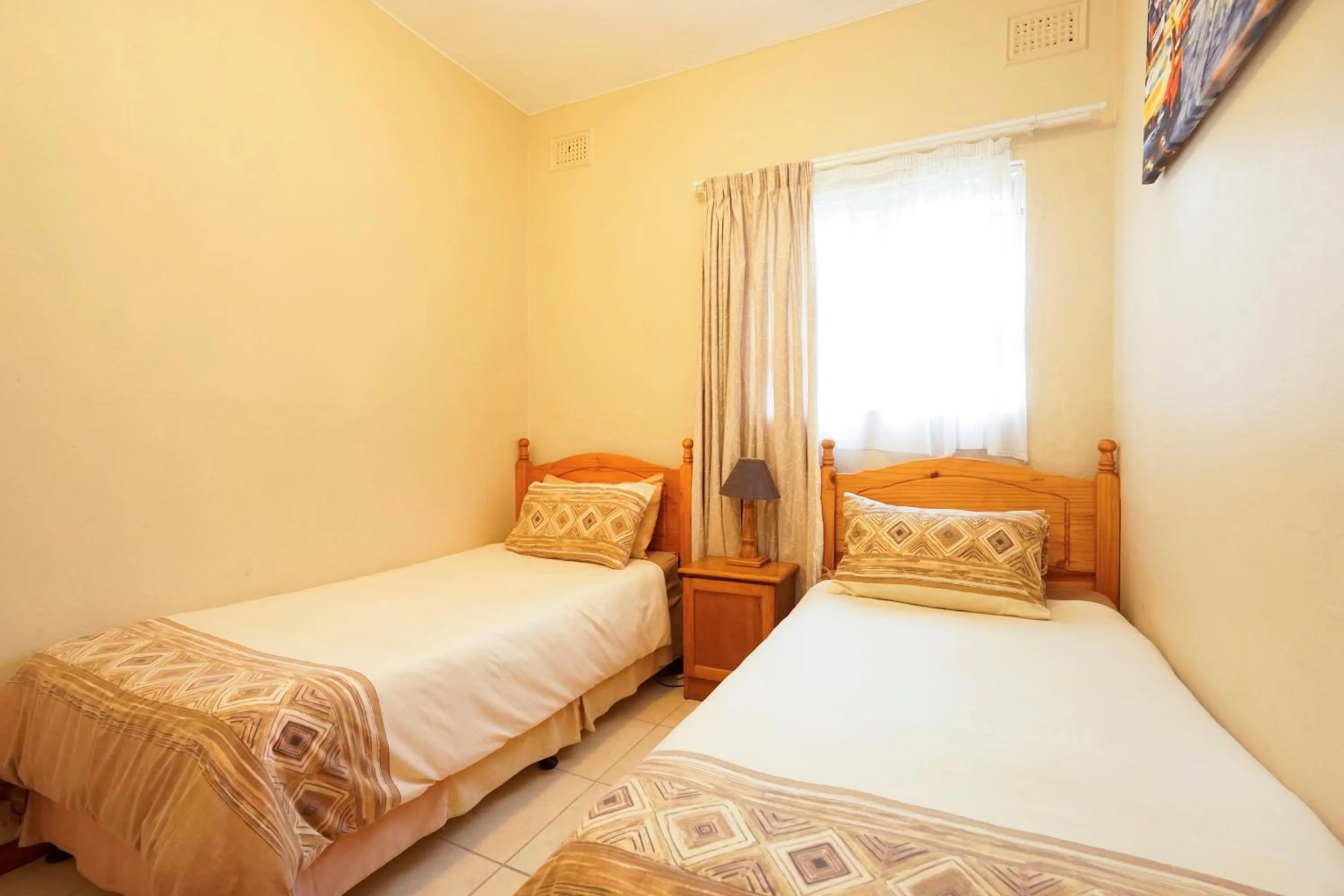 Bedroom, Bed in Doonside Holiday Apartments
