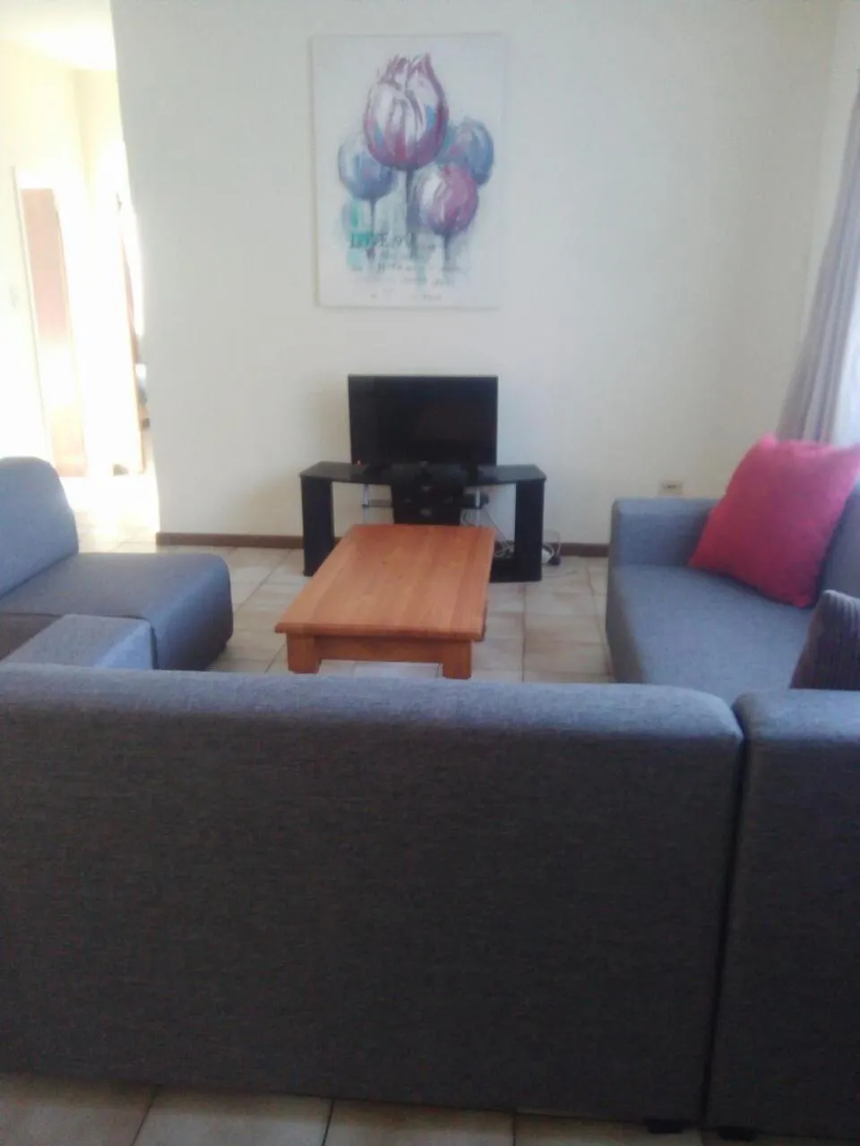 Living room in Doonside Holiday Apartments