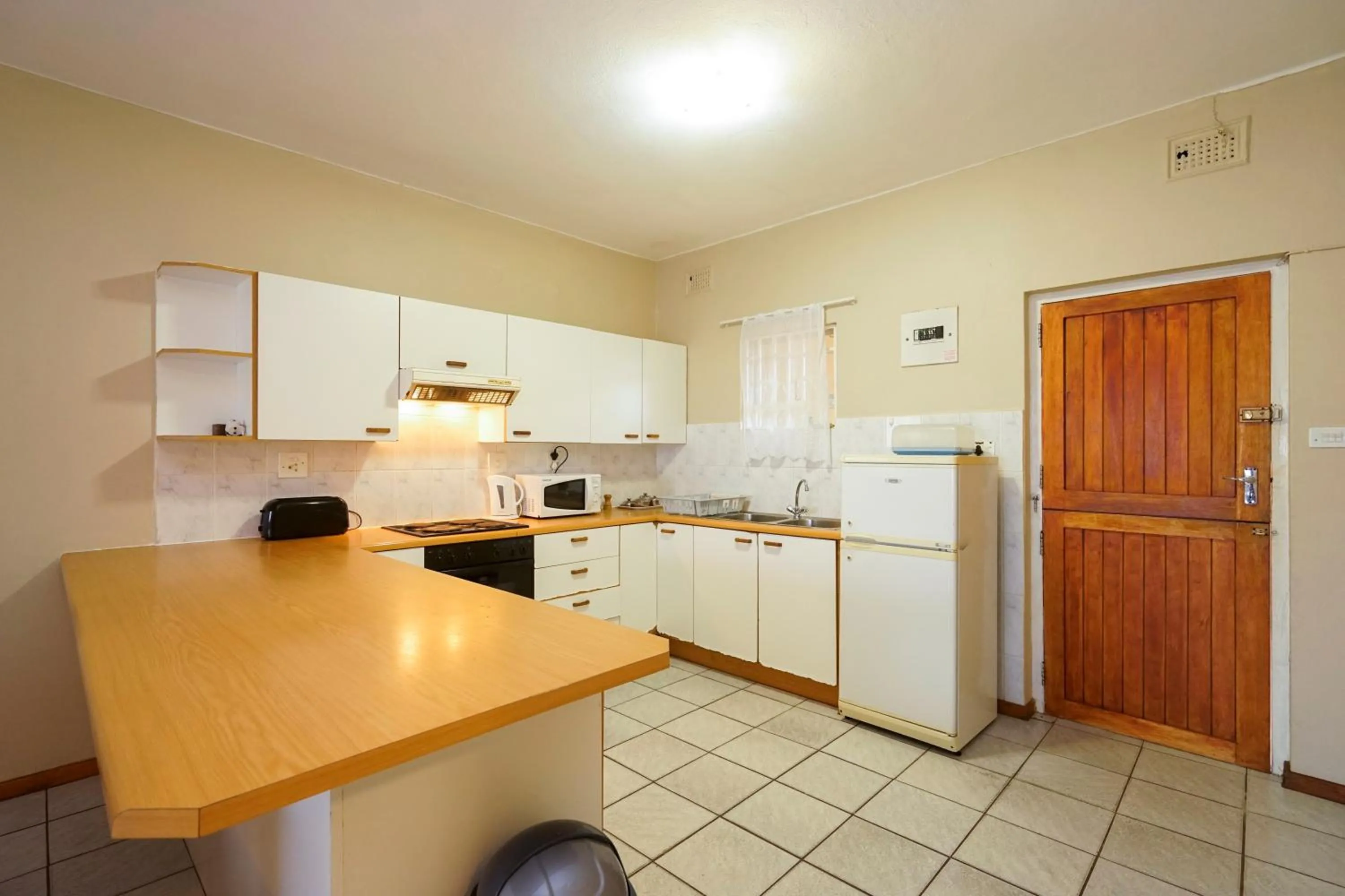 Kitchen or kitchenette in Doonside Holiday Apartments