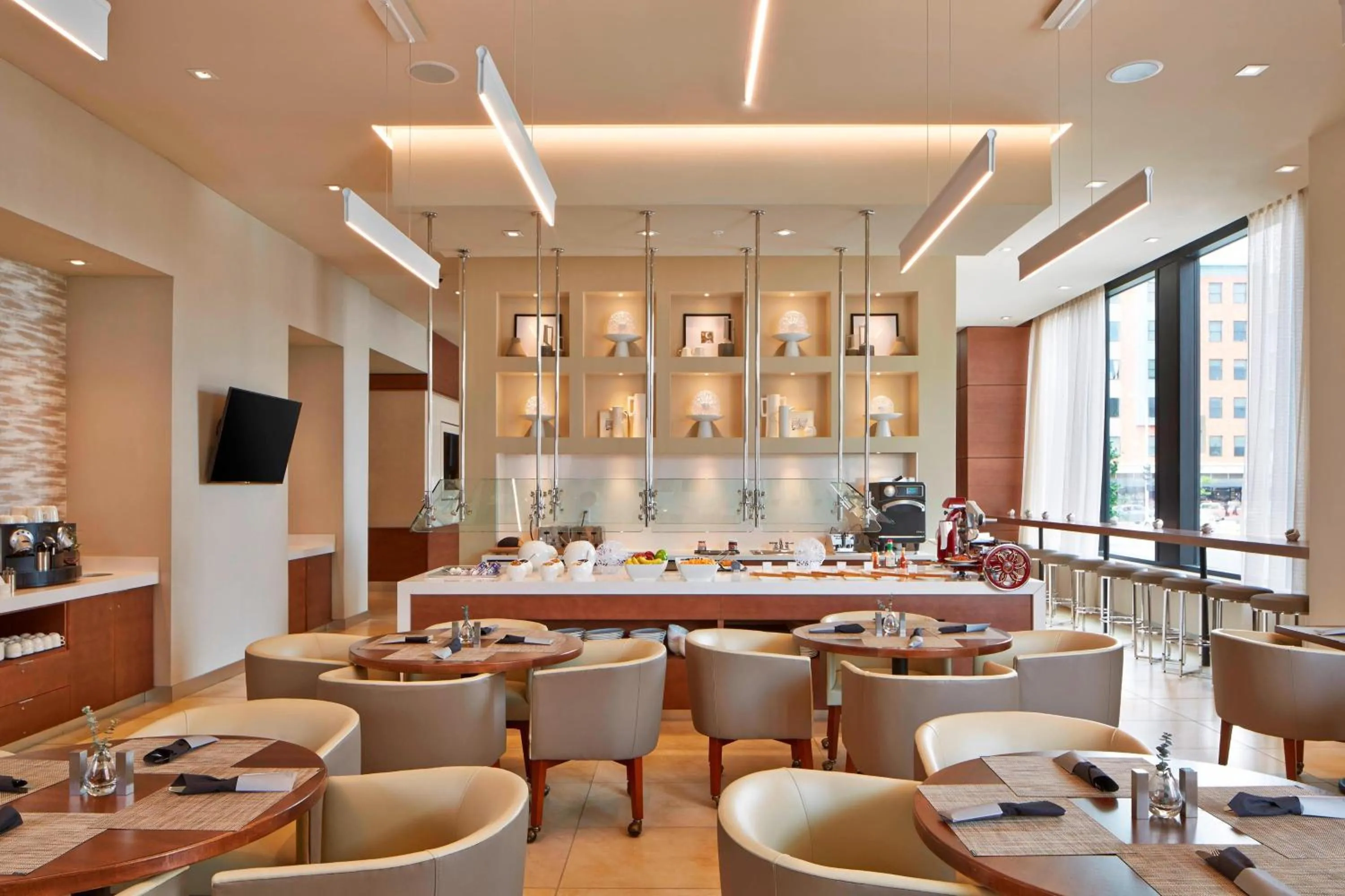 Kitchen or kitchenette in AC Hotel by Marriott Des Moines East Village