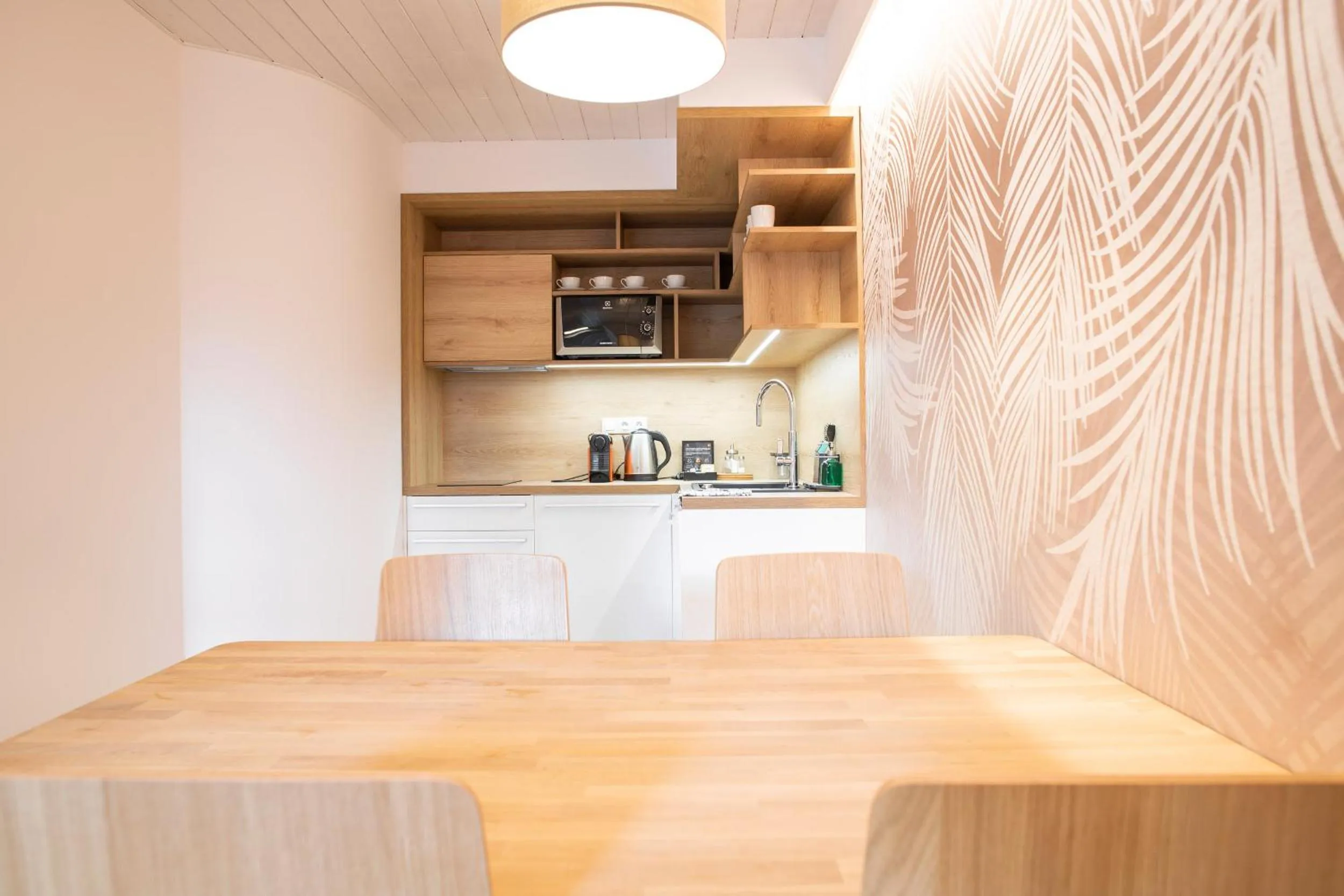 Kitchen or kitchenette in Amenity Hotel & Resort Špindlerův Mlýn