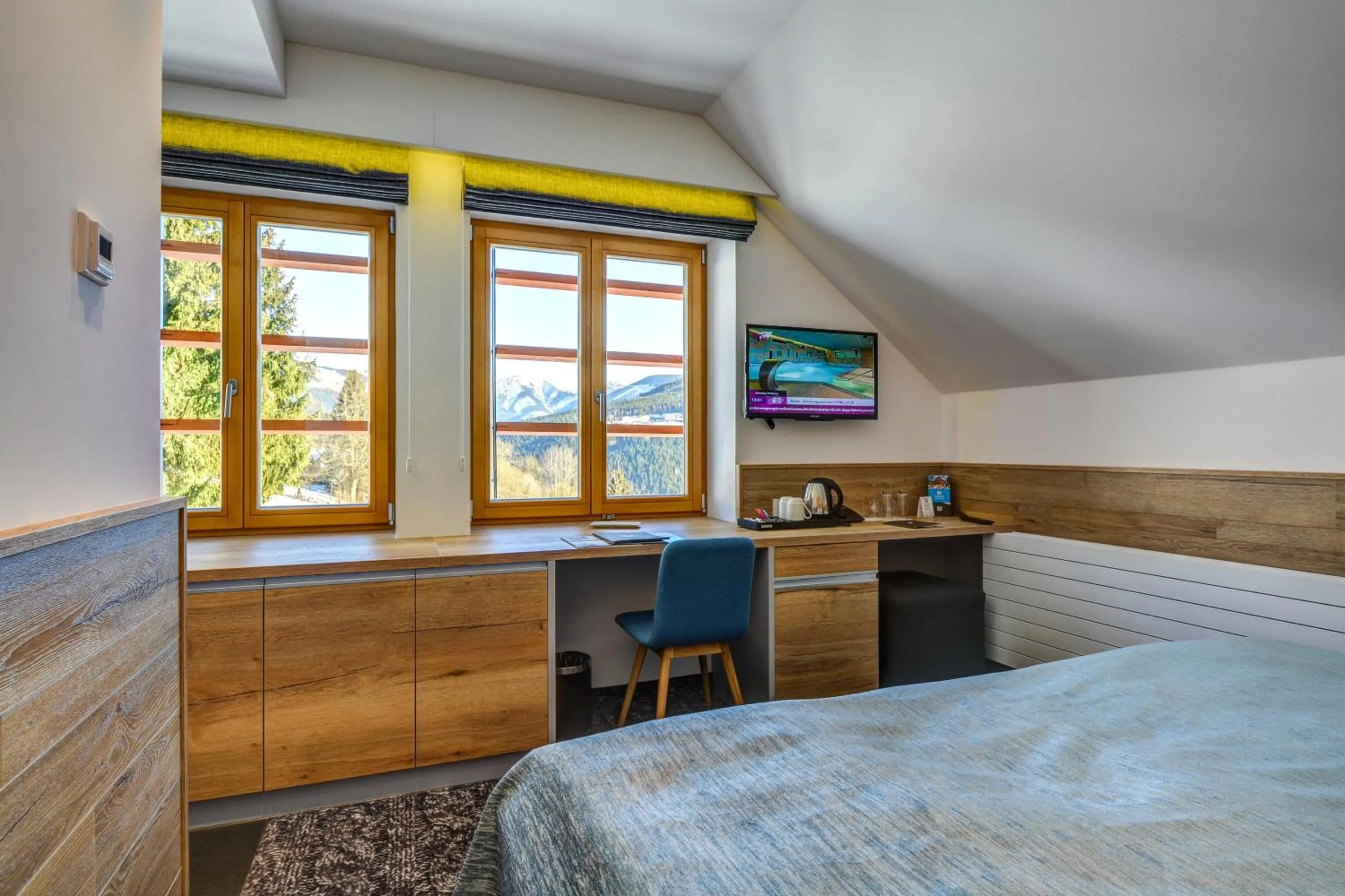 Seating area, Bed in Amenity Hotel & Resort Špindlerův Mlýn