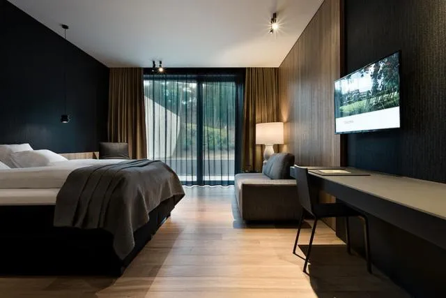 Bed in La Butte aux Bois a Small Luxury Hotel of the World