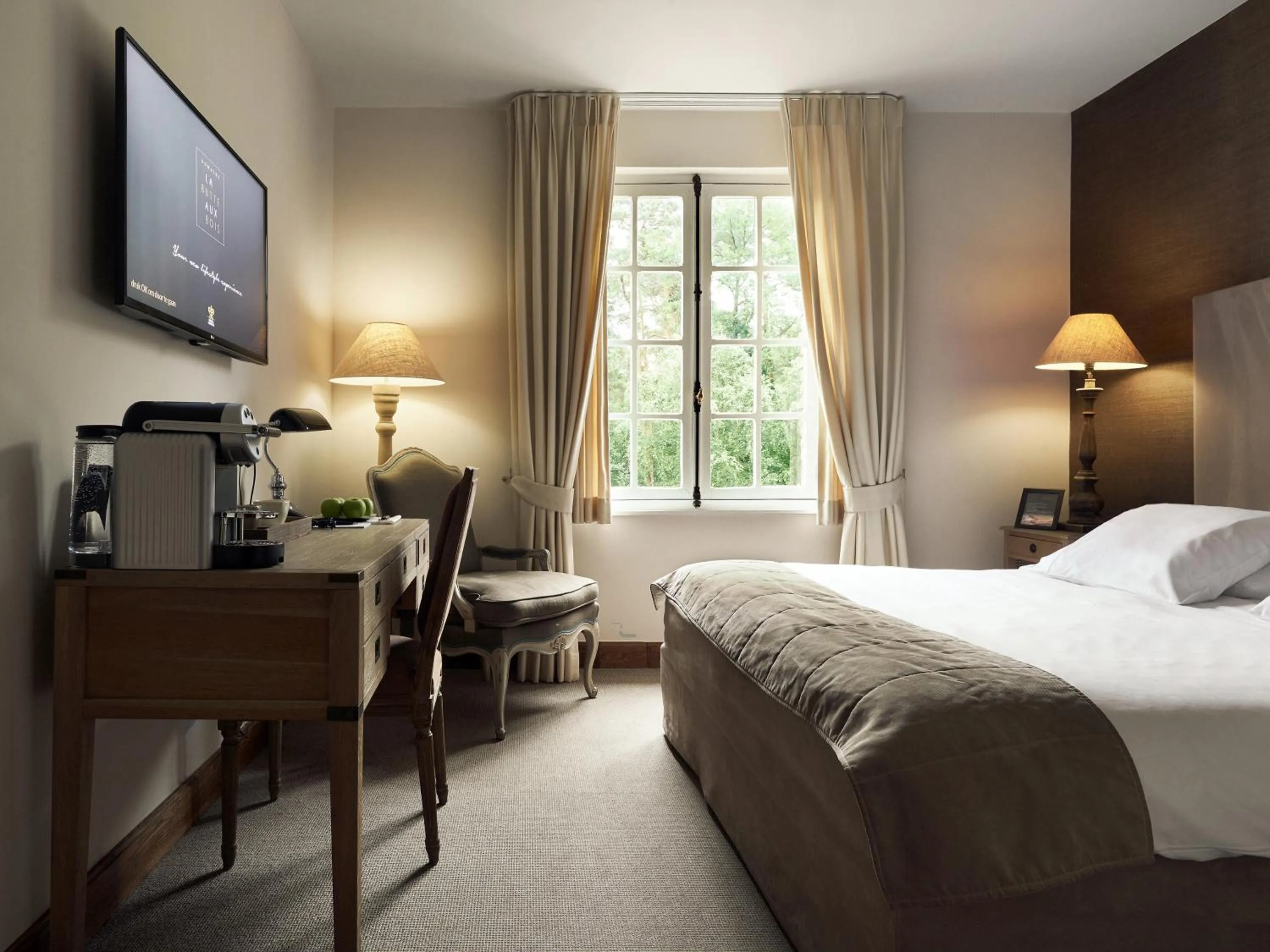 Bed in La Butte aux Bois a Small Luxury Hotel of the World