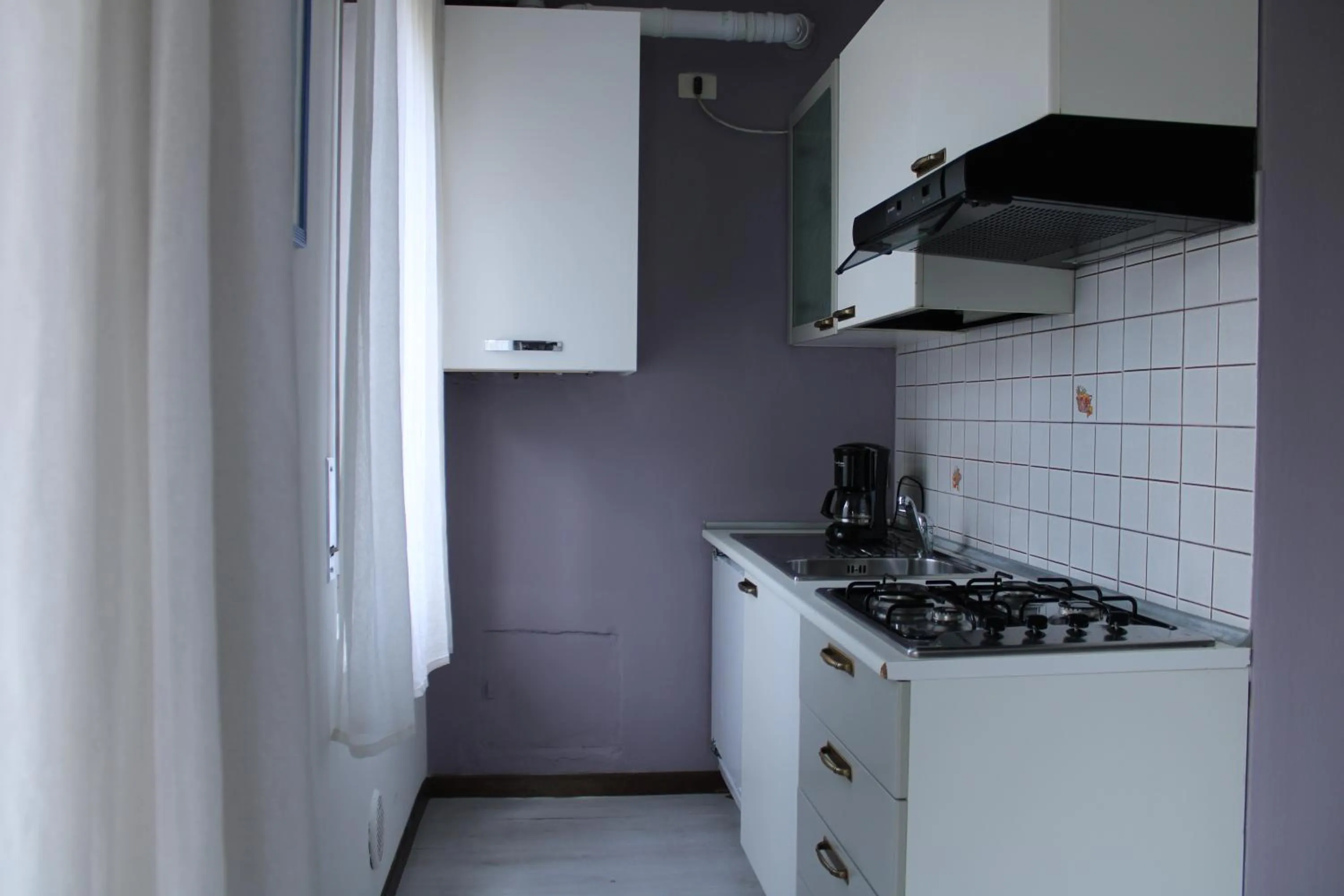 Kitchen or kitchenette in Residence Royal House