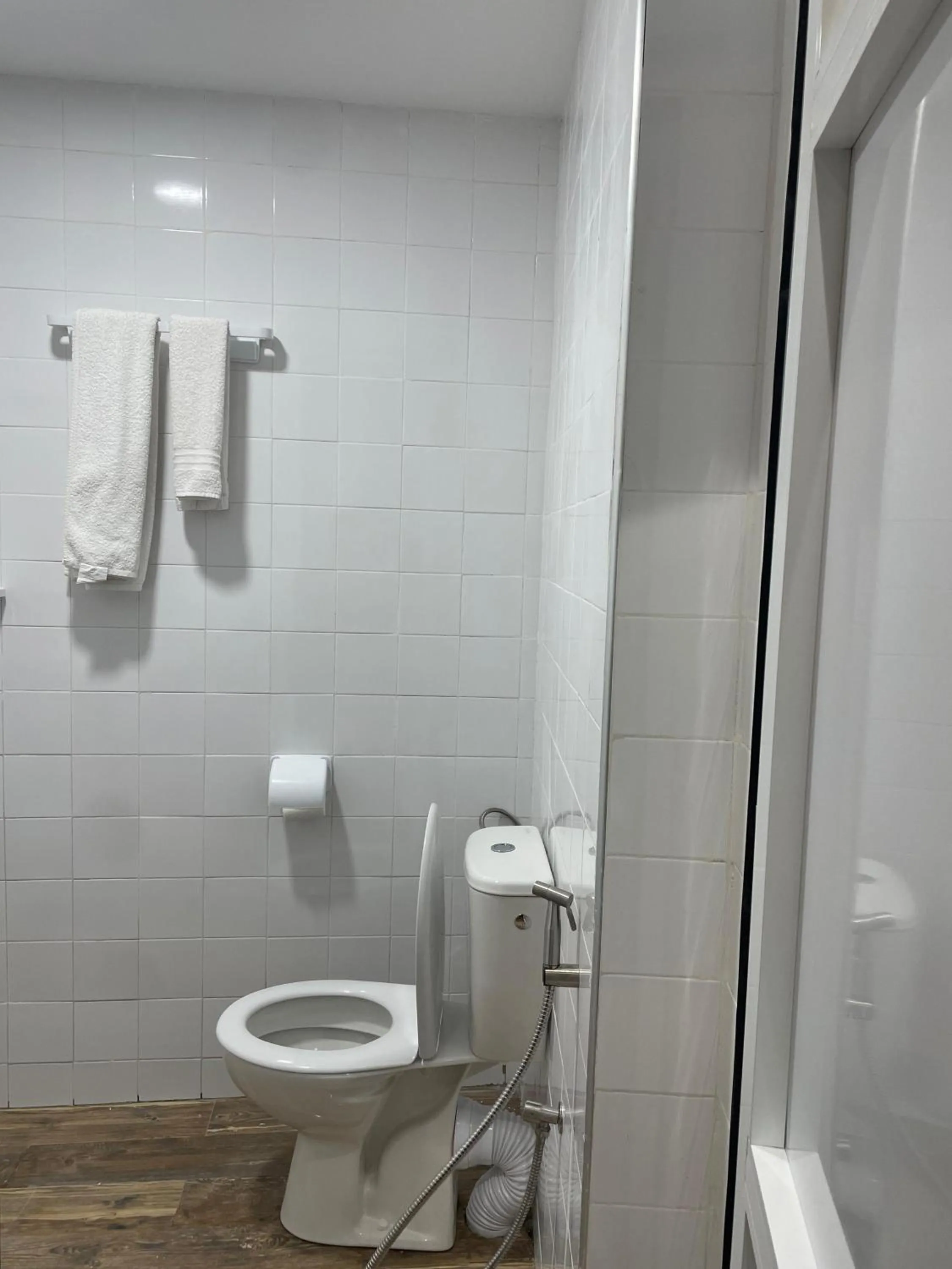 Bathroom in Hôtel-Café-Restaurant Pyramides,