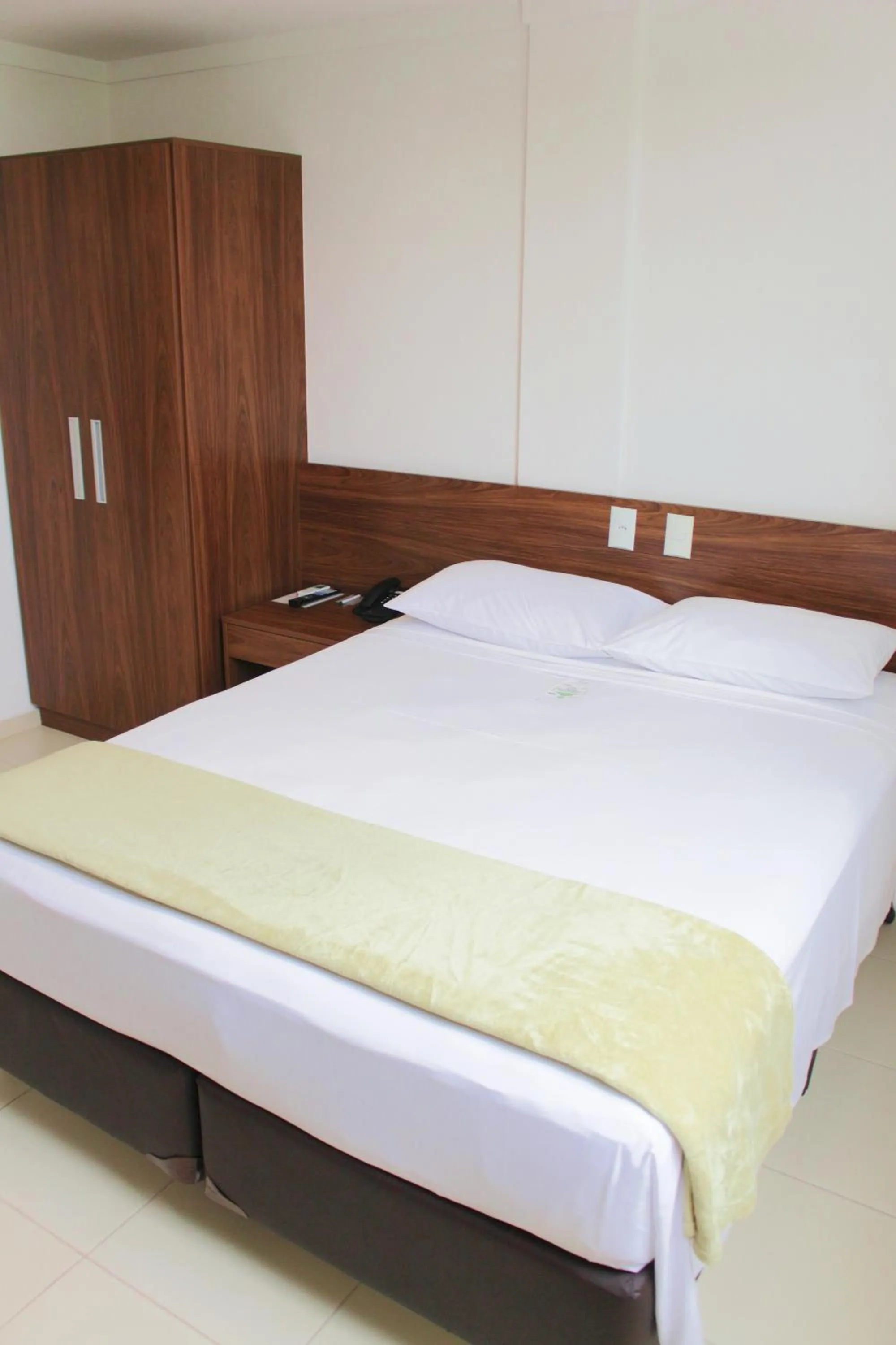 Bed in Hotel Jardins