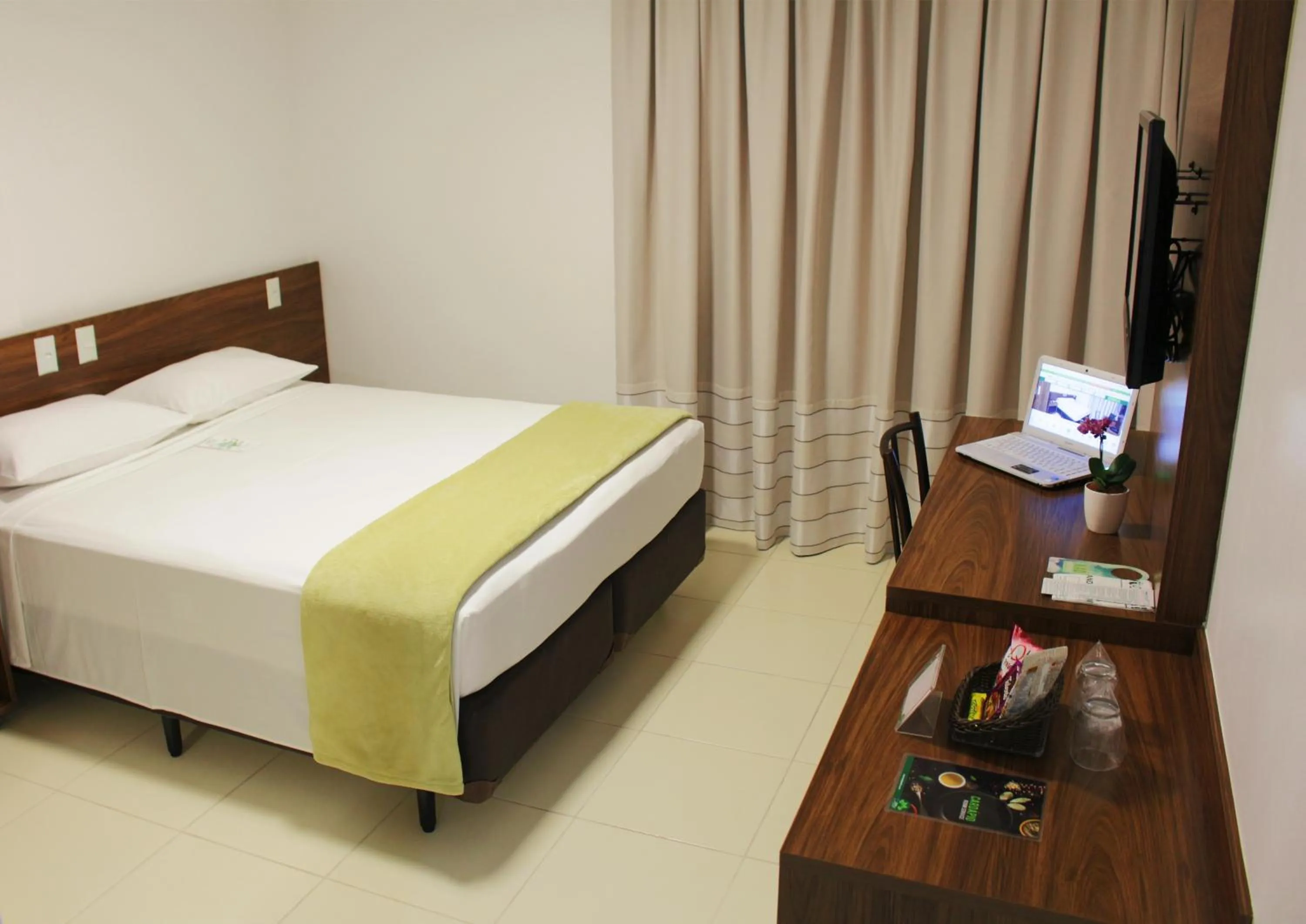 Bed in Hotel Jardins