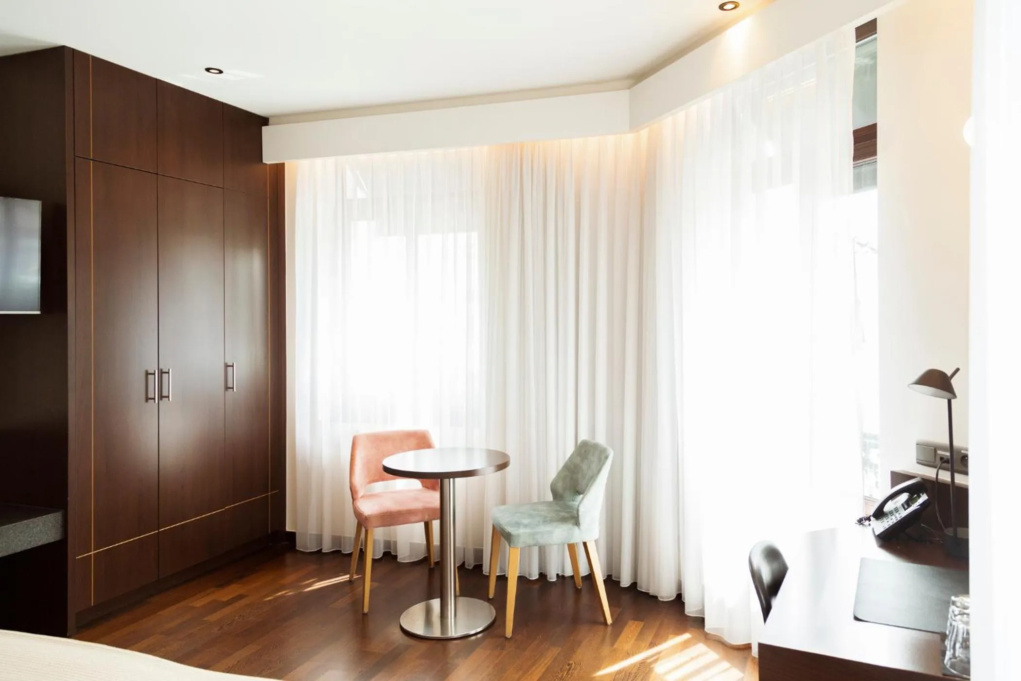 Seating area, Bed in Hotel The Century