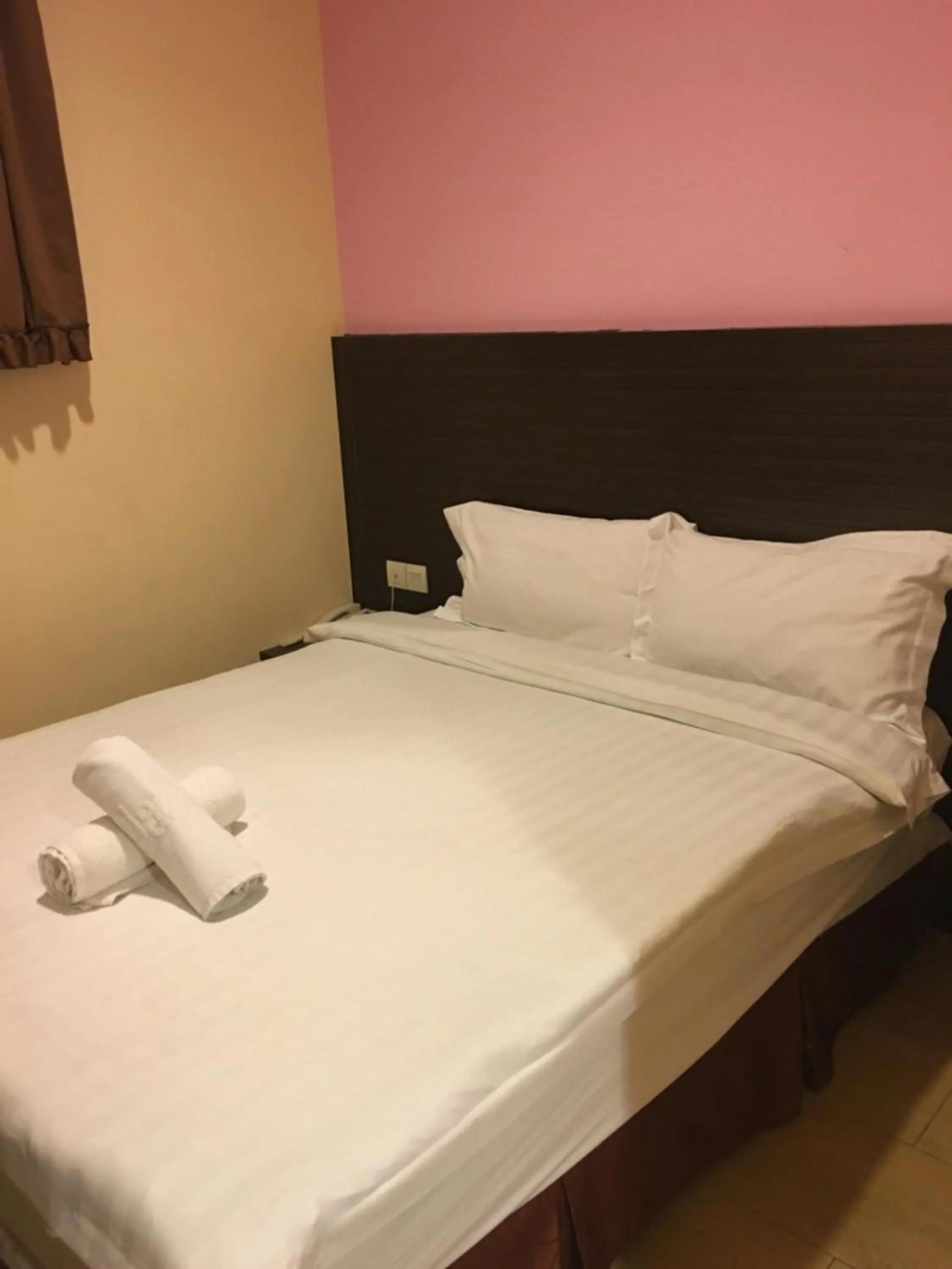 Bed in Lintas Plaza Hotel