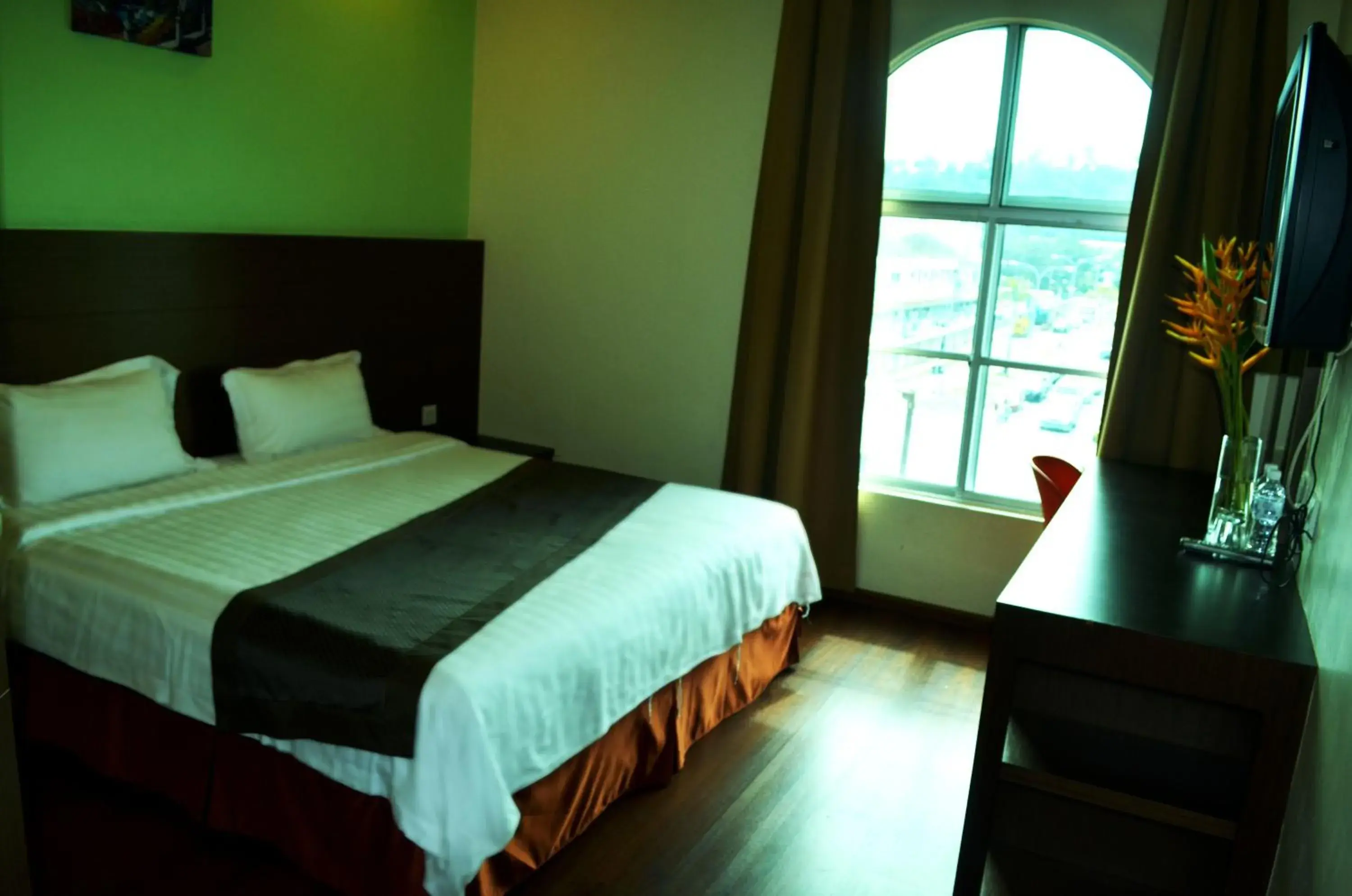 Bed in Lintas Plaza Boutique Hotel