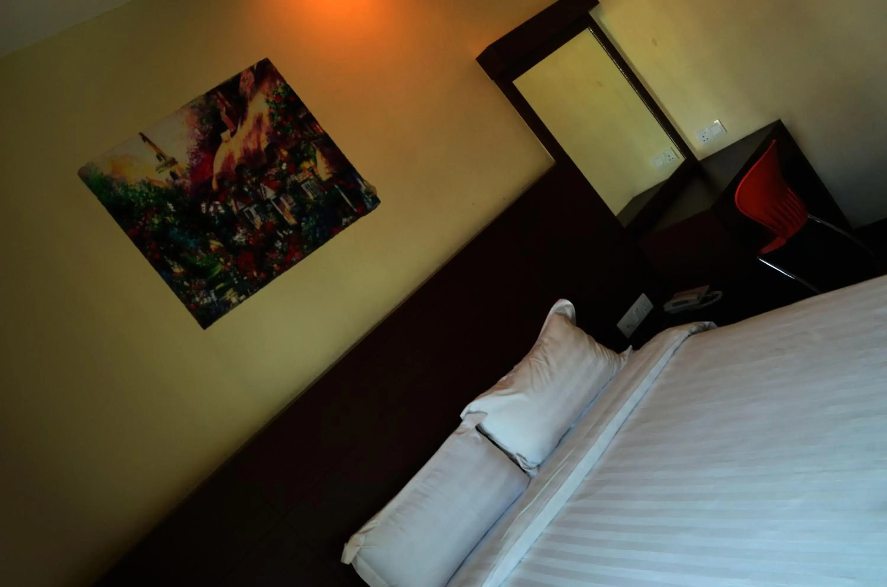 Bed in Lintas Plaza Boutique Hotel