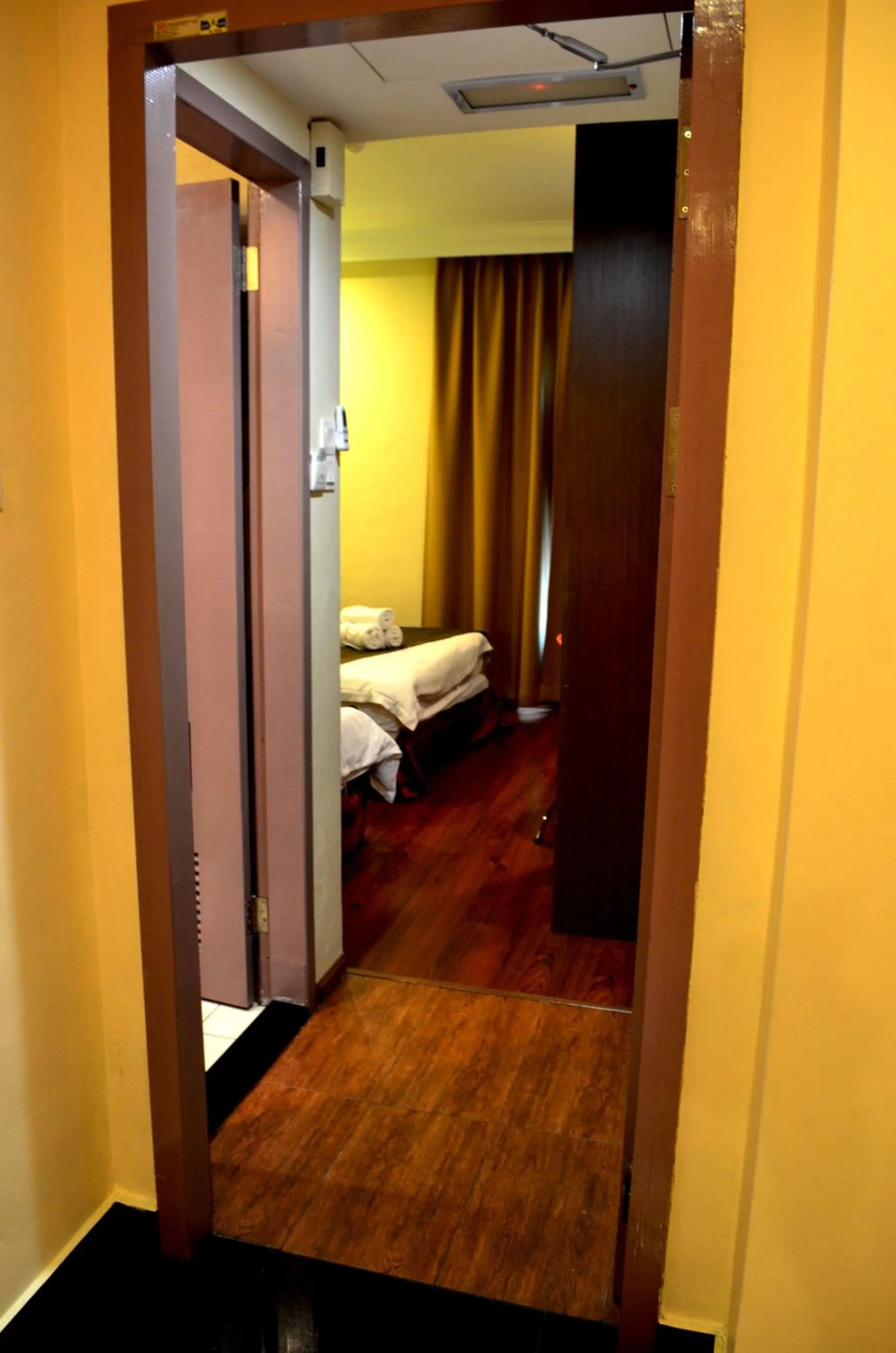 Bed in Lintas Plaza Hotel