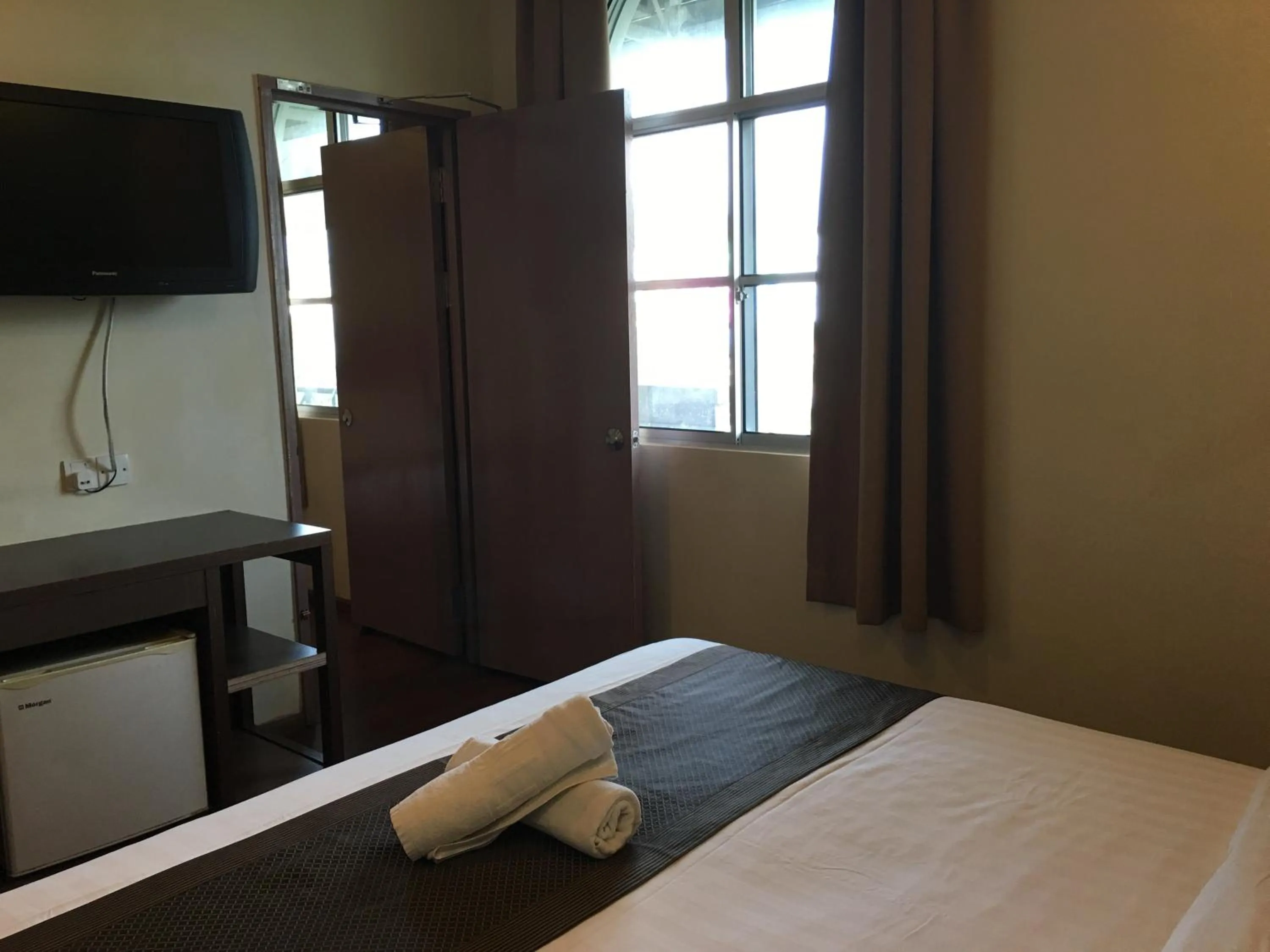 Bed in Lintas Plaza Hotel