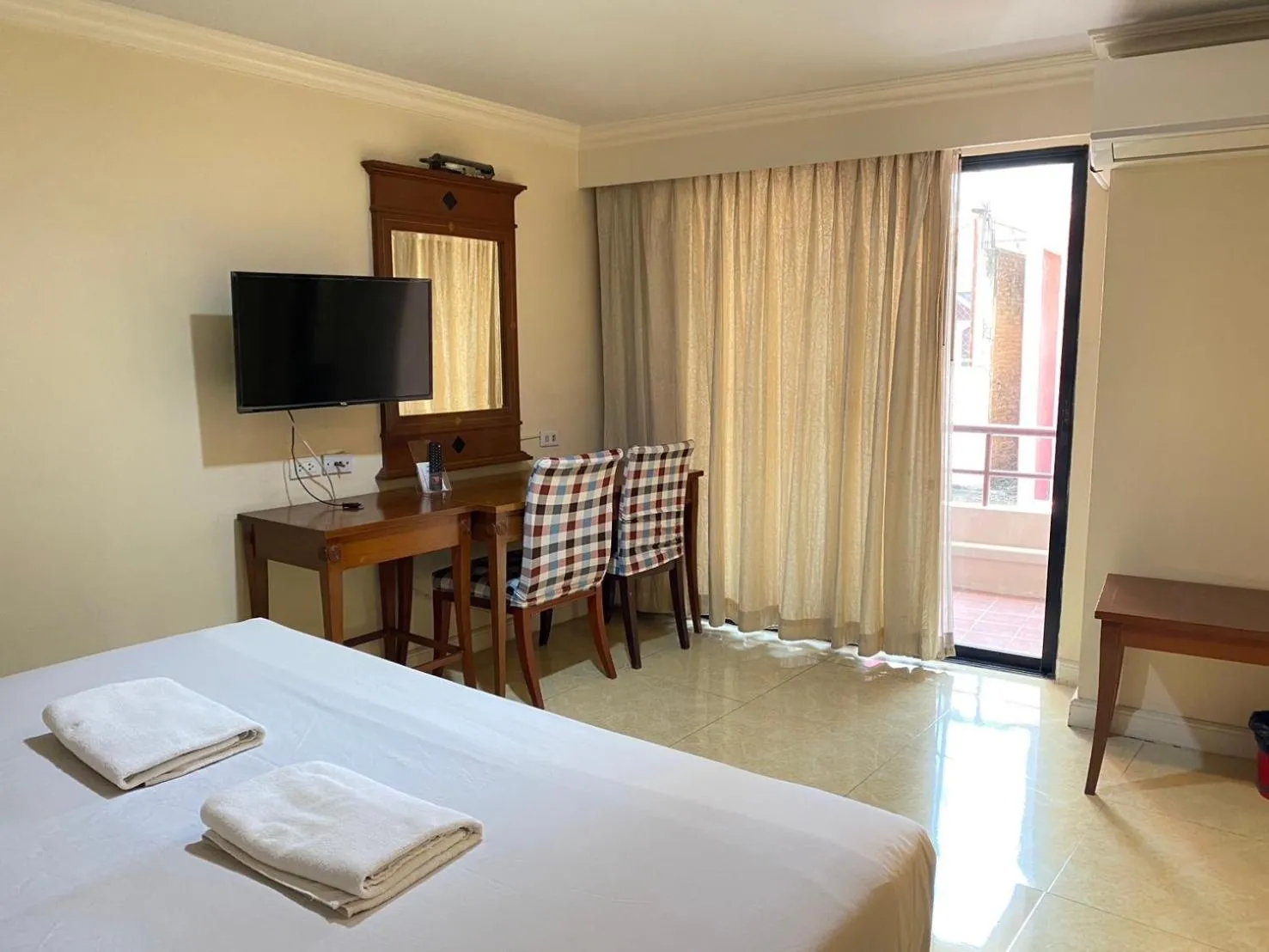 Bed in Jumbotel Hotel