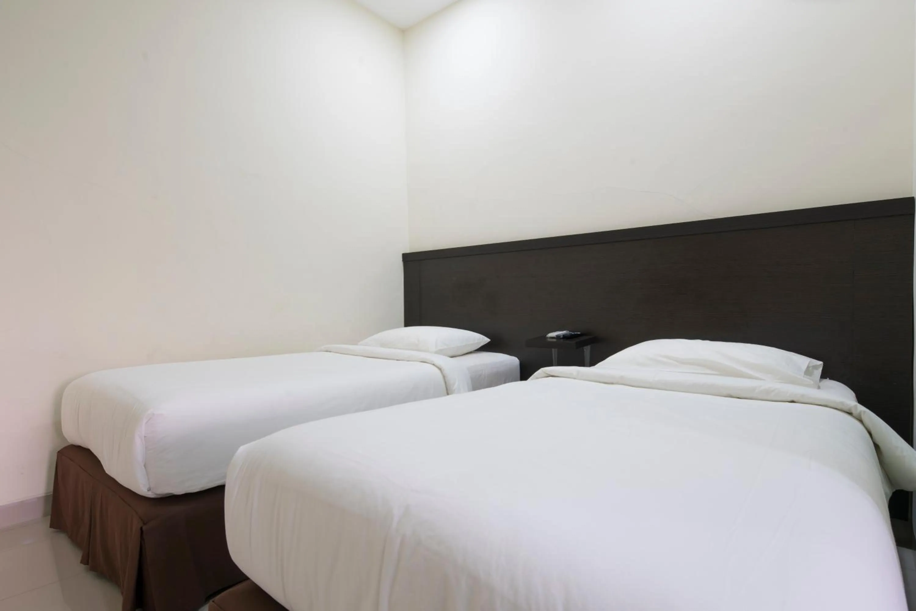 Photo of the whole room, Bed in Grand Kebonsari Guesthouse