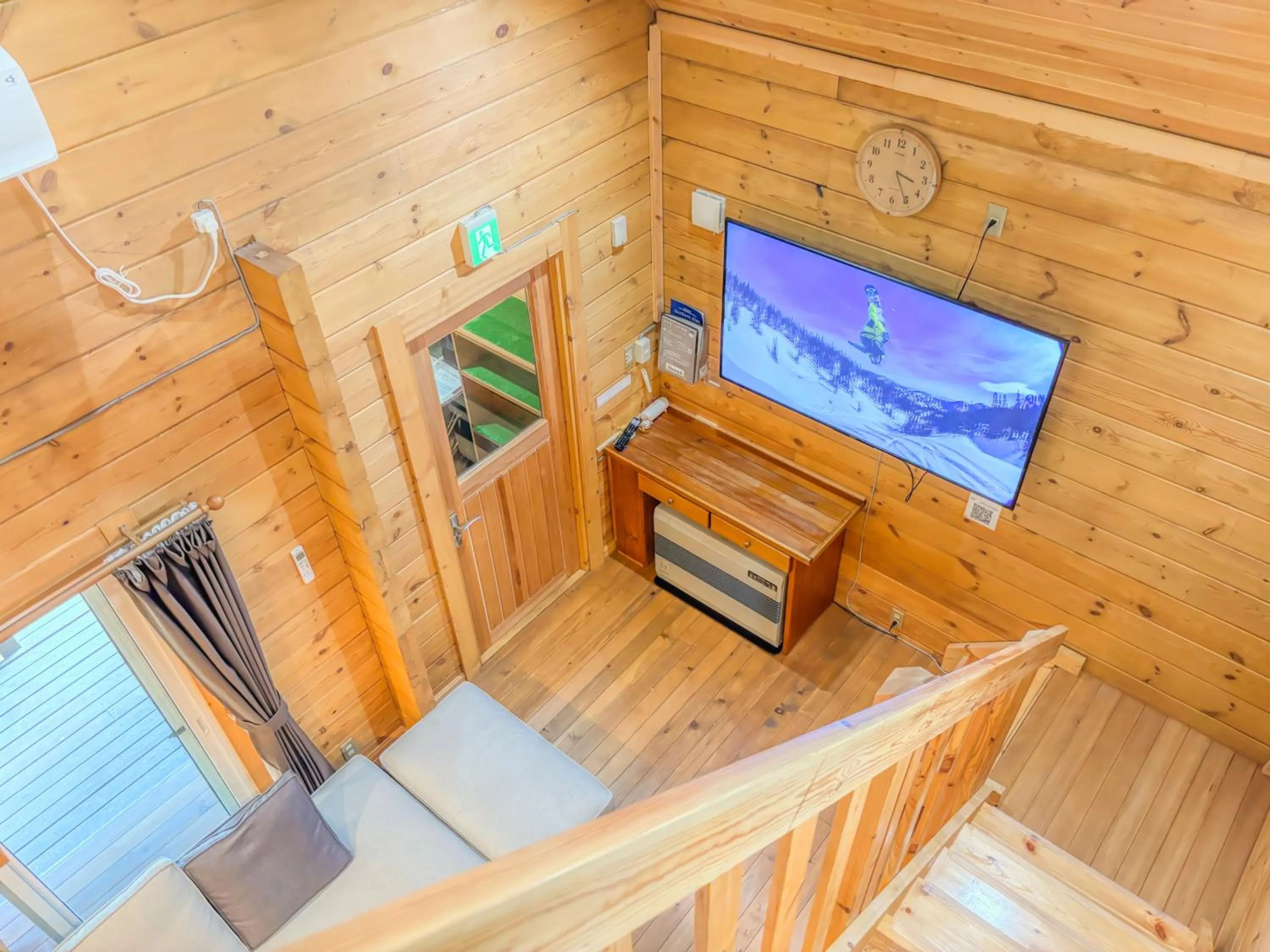 Communal lounge/ TV room in HAL Cottage