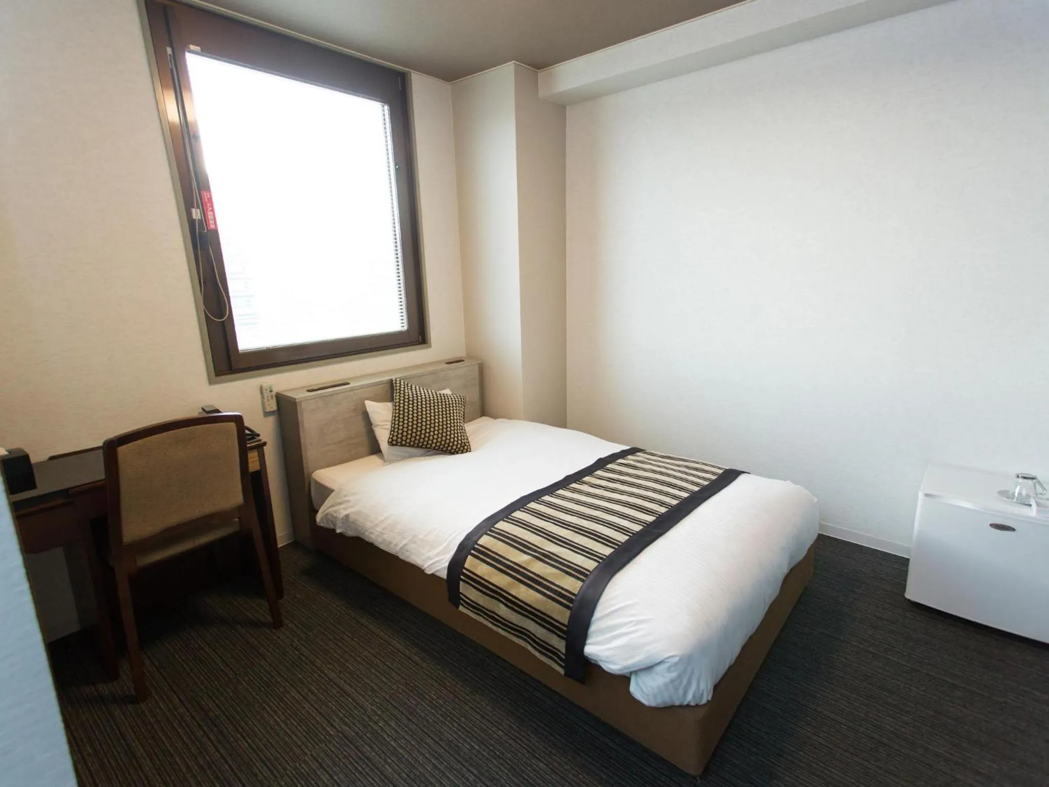 Photo of the whole room, Bed in Hotel AreaOne Nobeoka