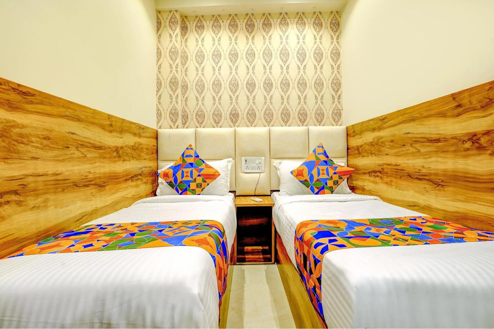 Bed in FabHotel Indore Palace