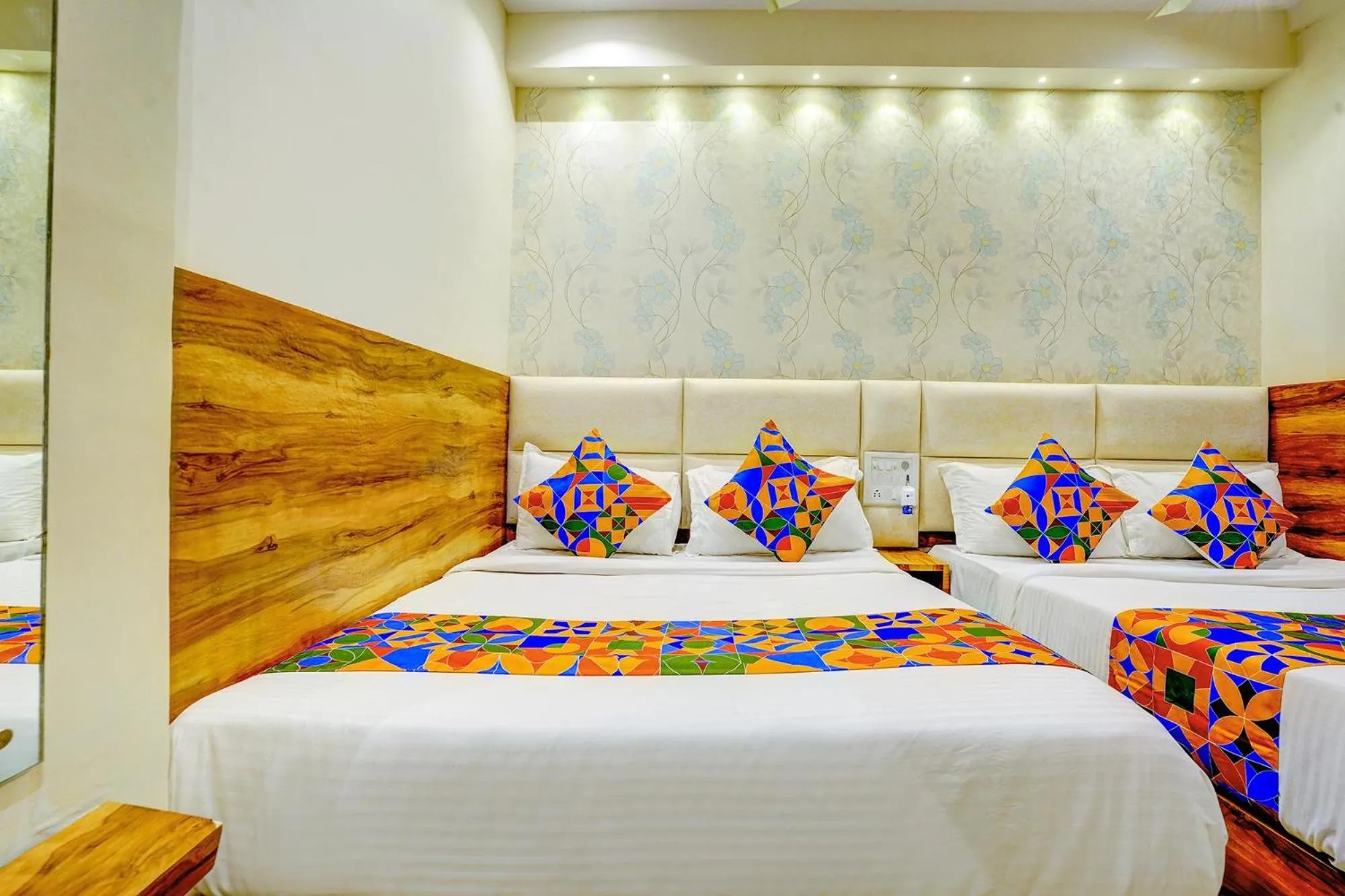 Bed in FabHotel Indore Palace