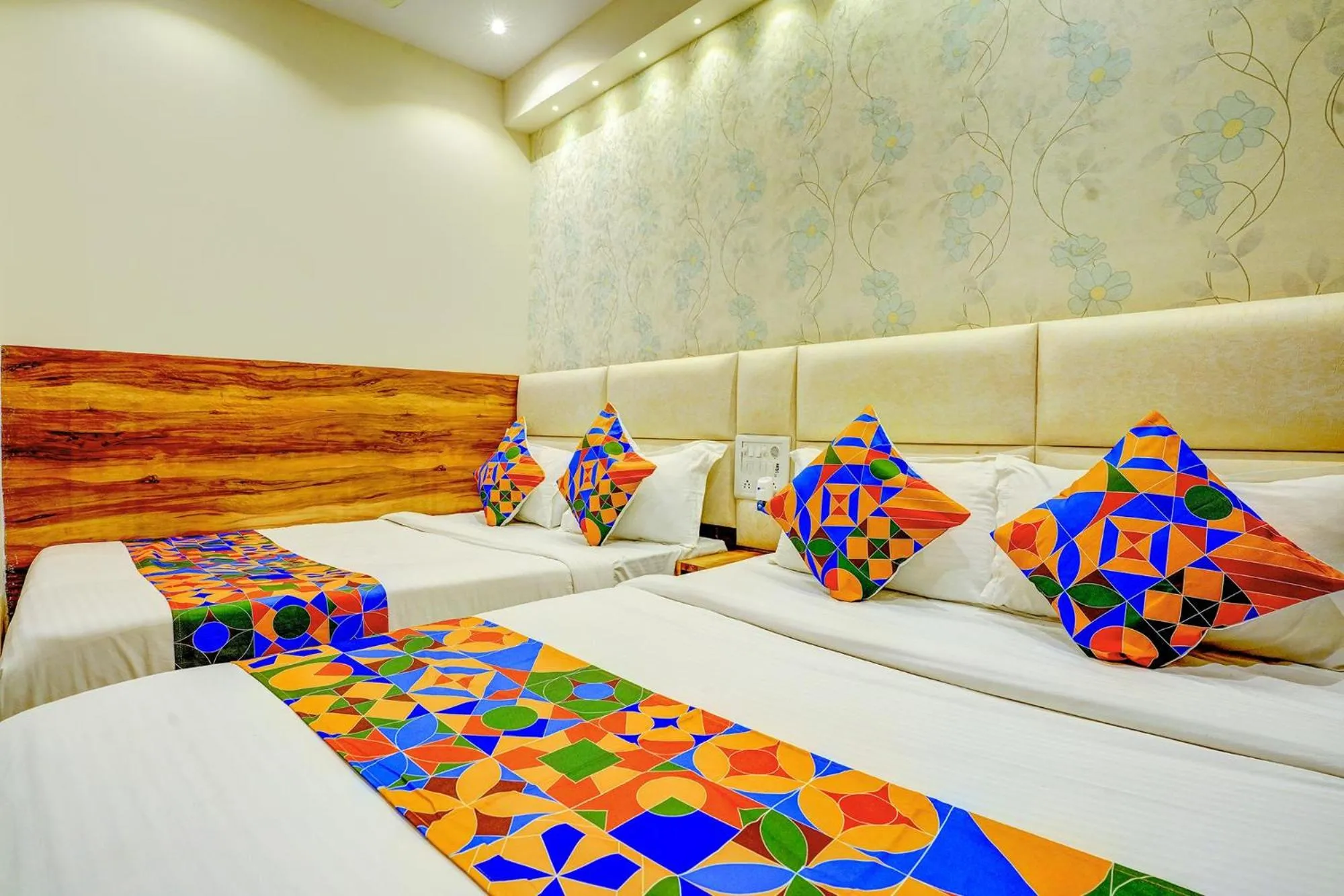 Bed in FabHotel Indore Palace