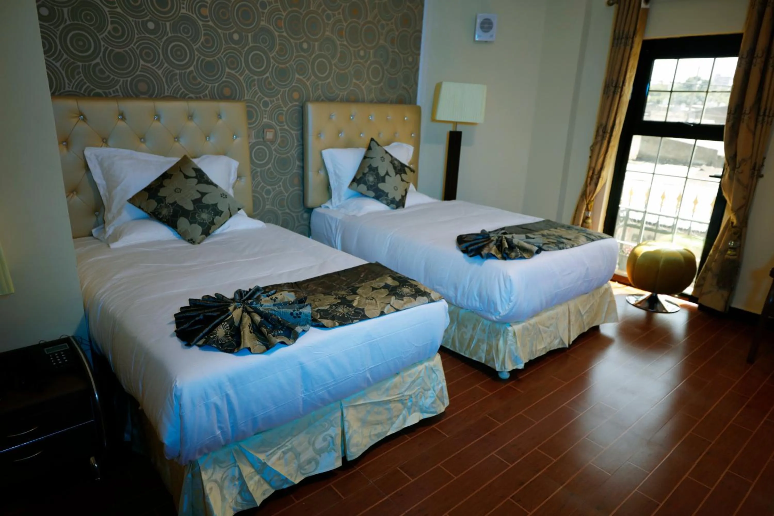 Bed in Afropolitan Hotel